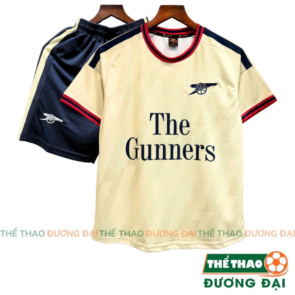 Quần Áo Bóng Đá The Gunner Kem 26/27 Thun Mè S-COMF Thoáng Khí Thể Thao Đương Đại