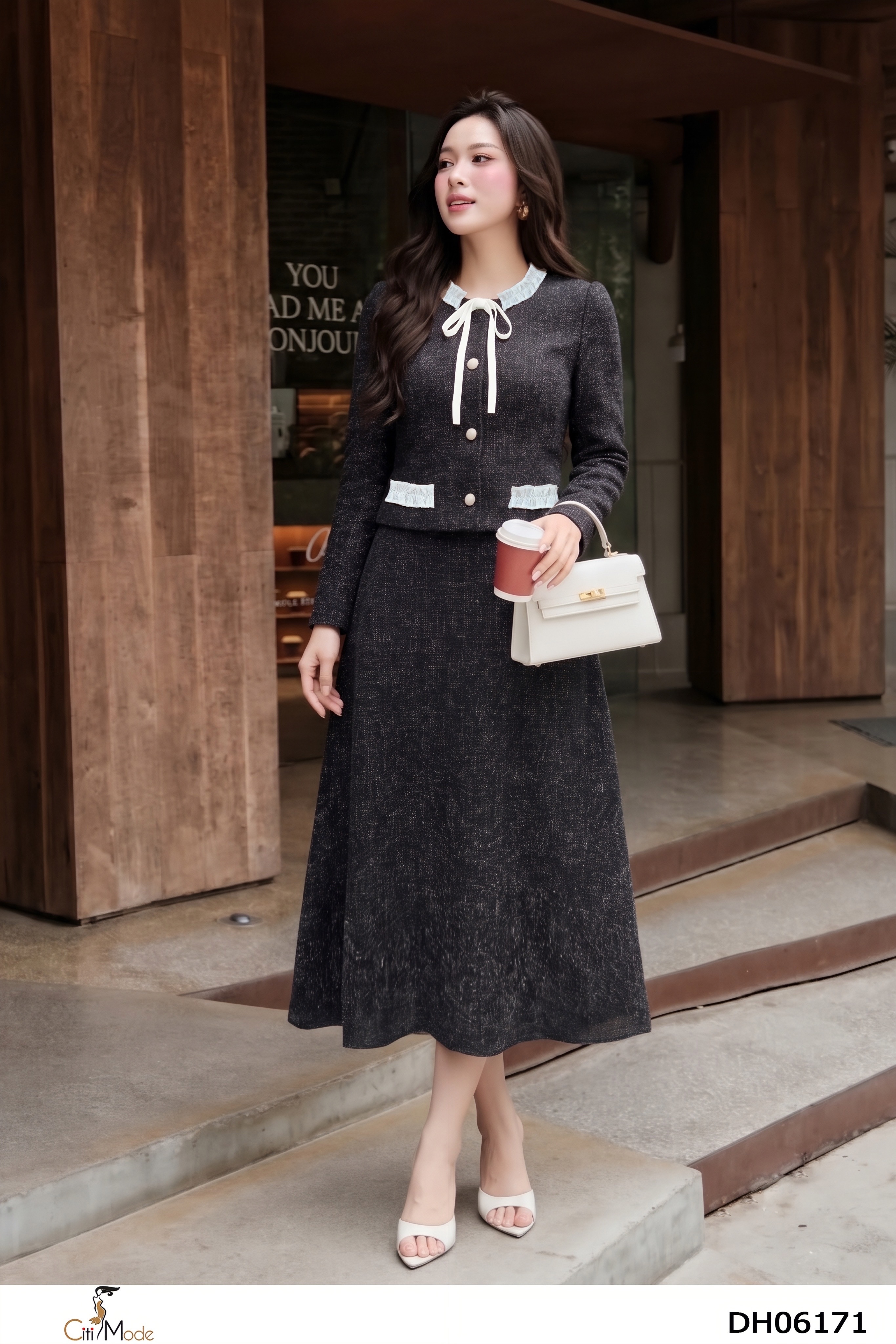 Đầm xòe giả sét đen tay dài cổ nhún