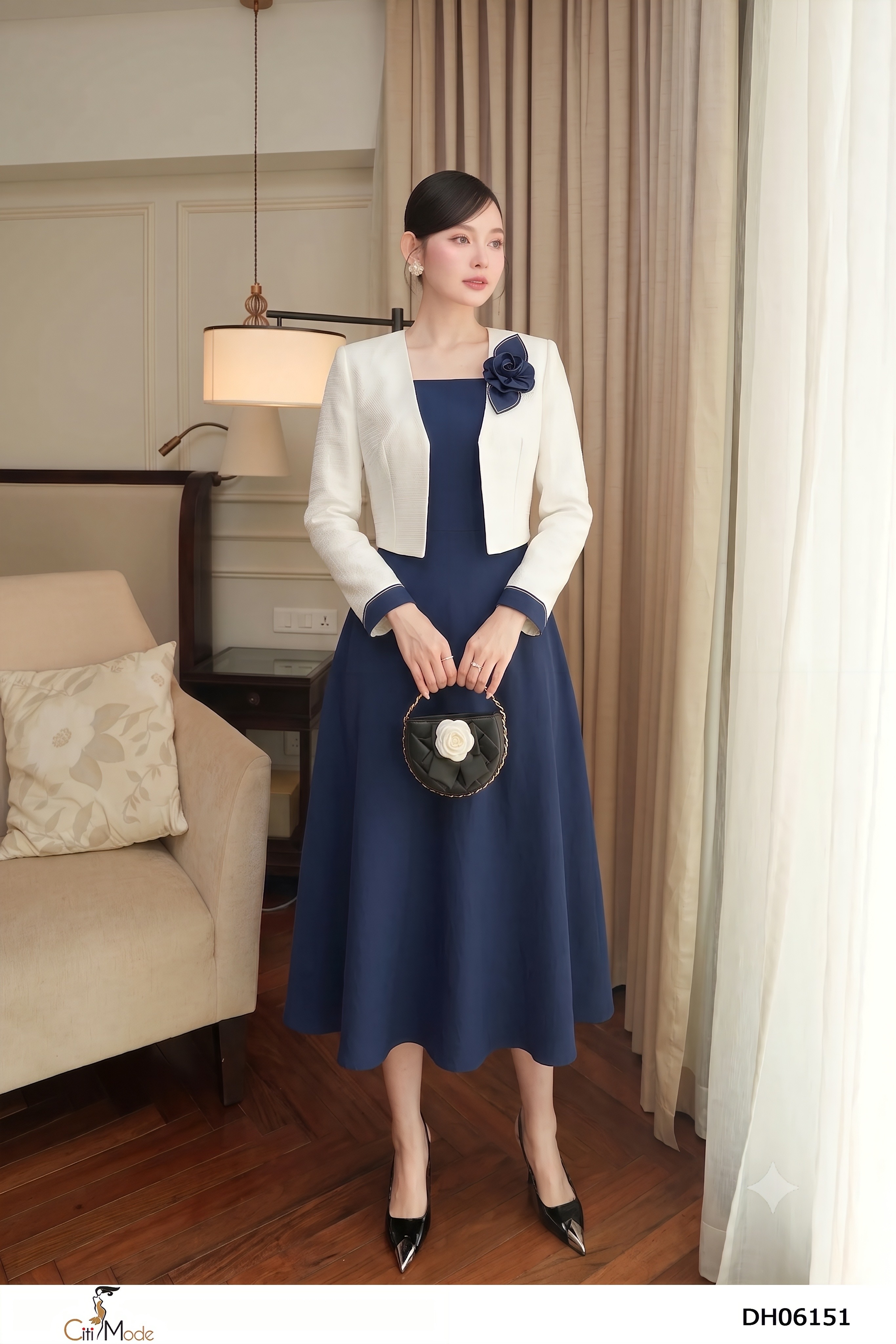 Đầm xòe giả sét xanh đen phối dạ trắng tay dài, cổ dính nơ hoa