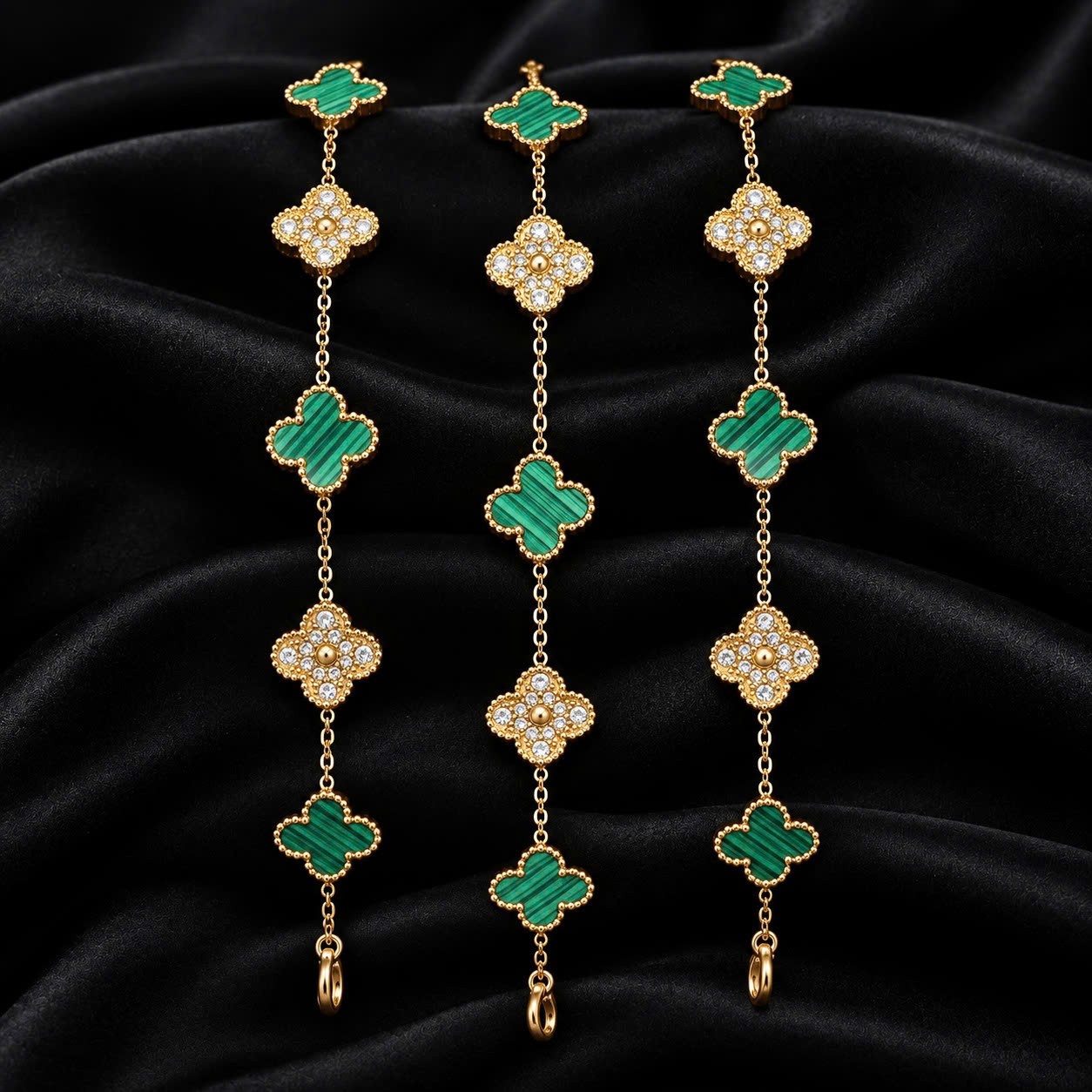 Vòng tay van cleef đá xanh xen kẽ đá kim cương màu vàng