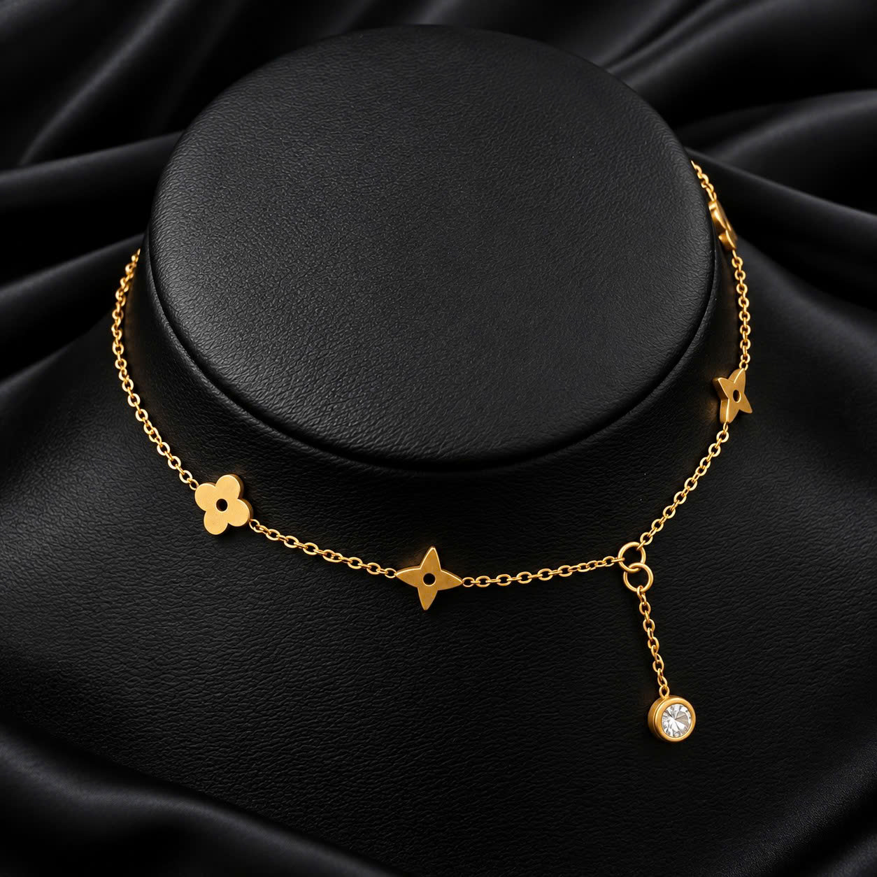 lắc chân titan sợi vàng hoa bốn cánh charm rơi kim cương._thumbnail_1