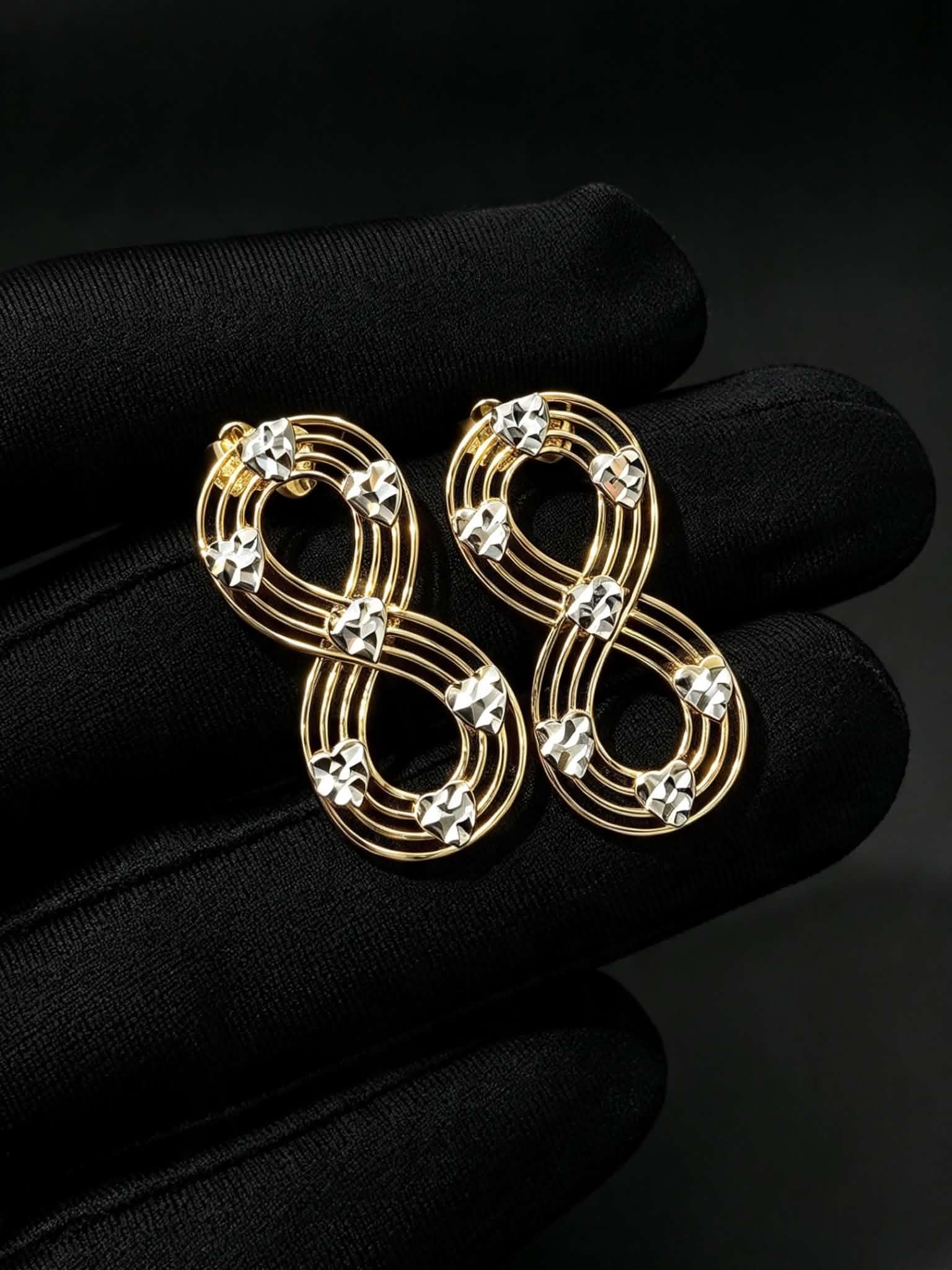 TWO TONED INFINITY STUD EARRING SUBASTA