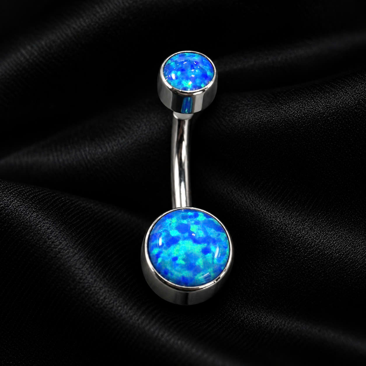 rốn titan hình trụ đá opal xanh dương.
