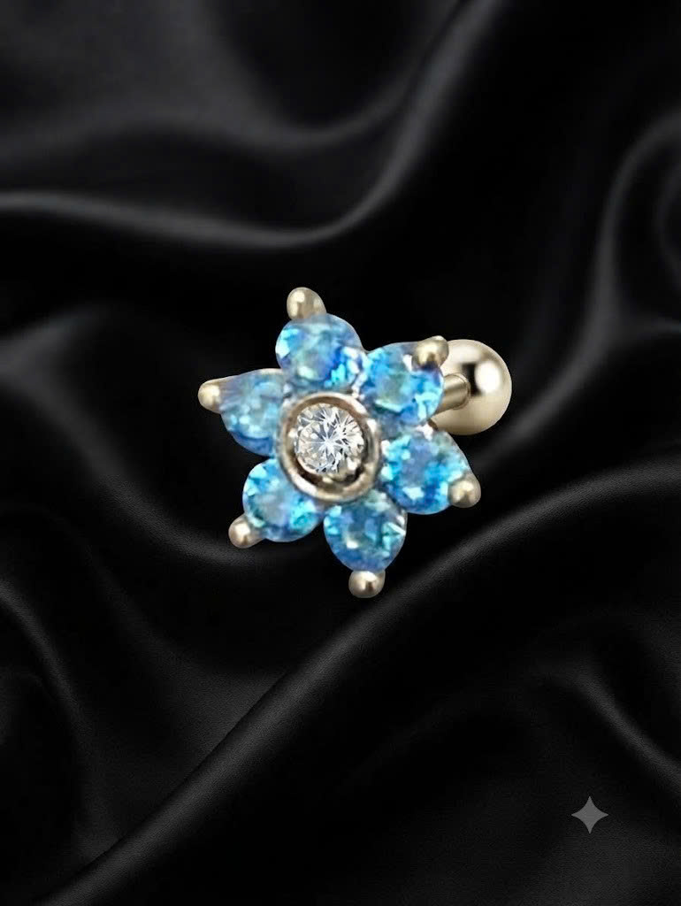 Charm cấy thép bông hoa xanh.