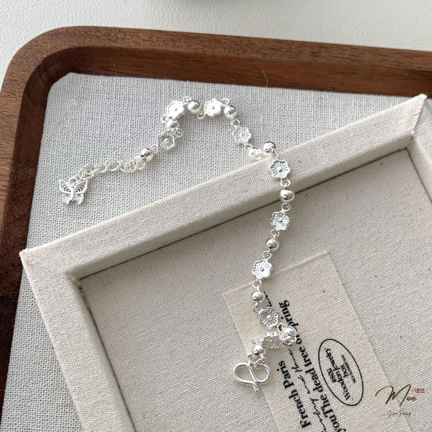 LT640 - Lắc tay hoa đào hồ điệp