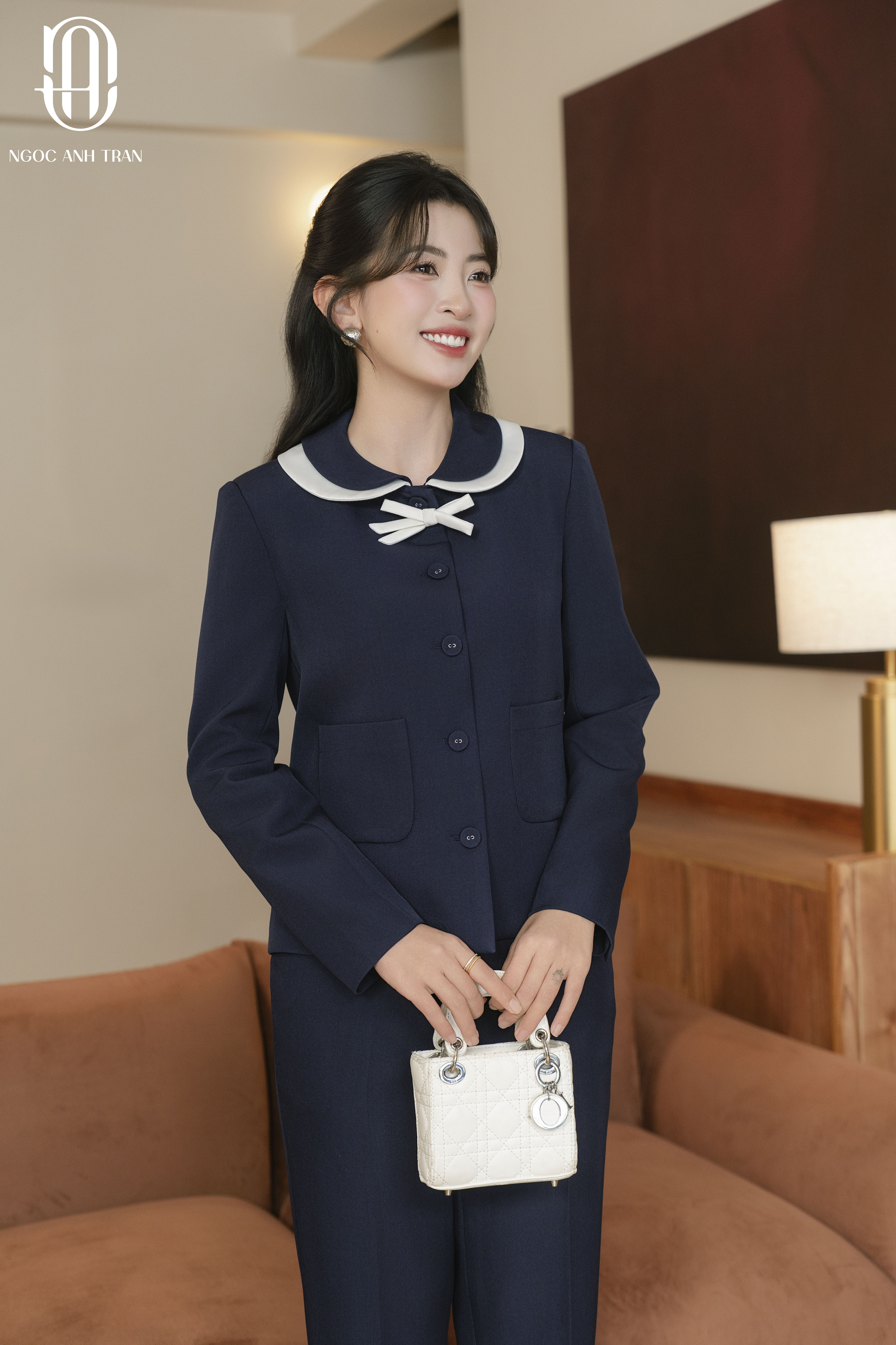 A257 - Áo xanh than dài tay cổ sen nơ trắng