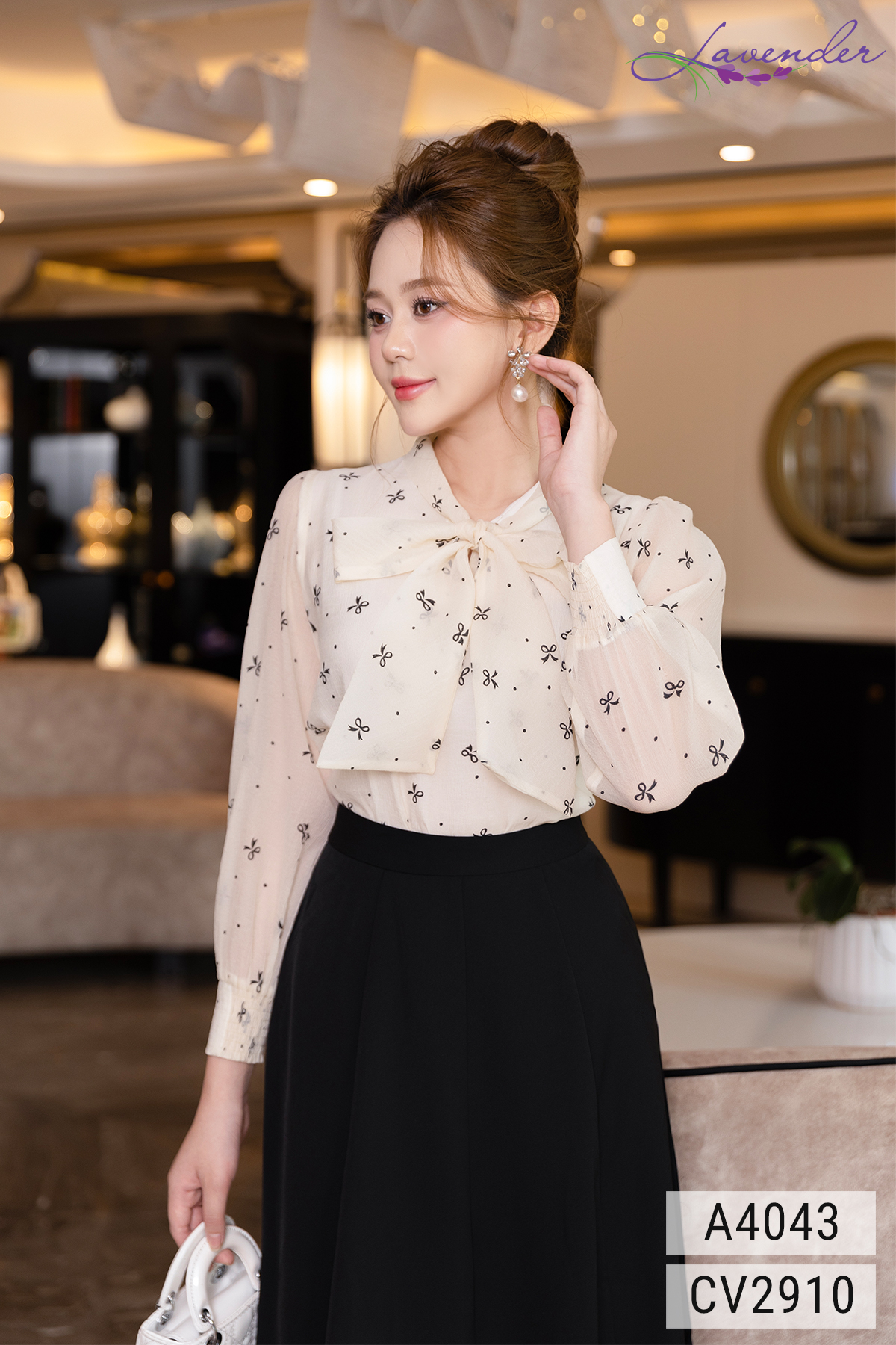 Áo sơ mi cổ nơ màu be hình nơ đen A4043