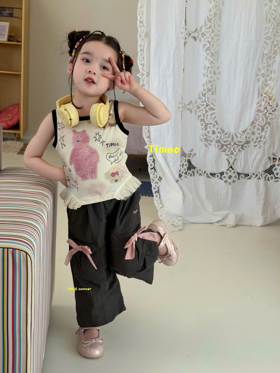 A123 - Quần dài nơ hồng màu đen hãng Timoo