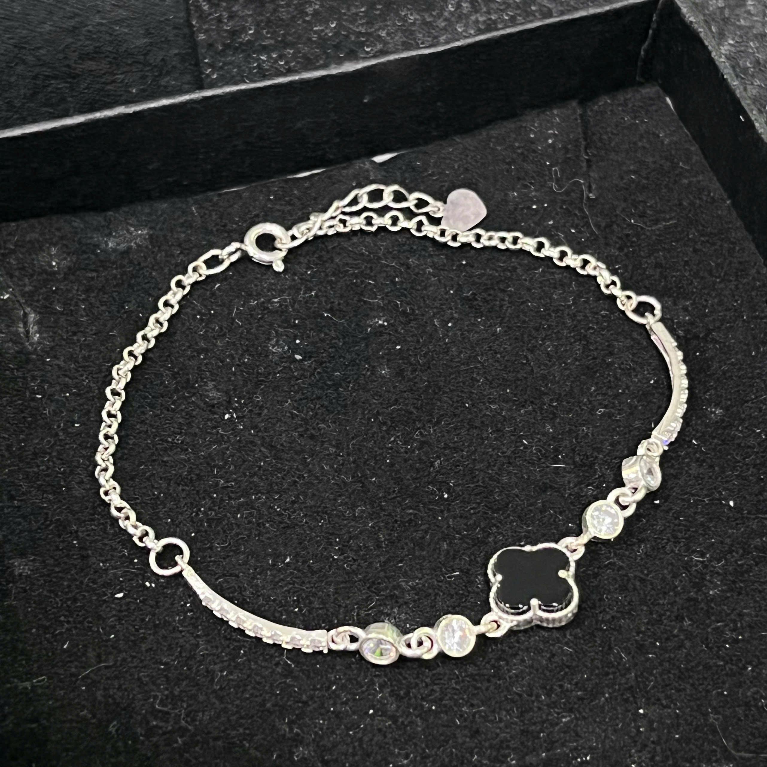 vòng tay bạc van cleef đá đen