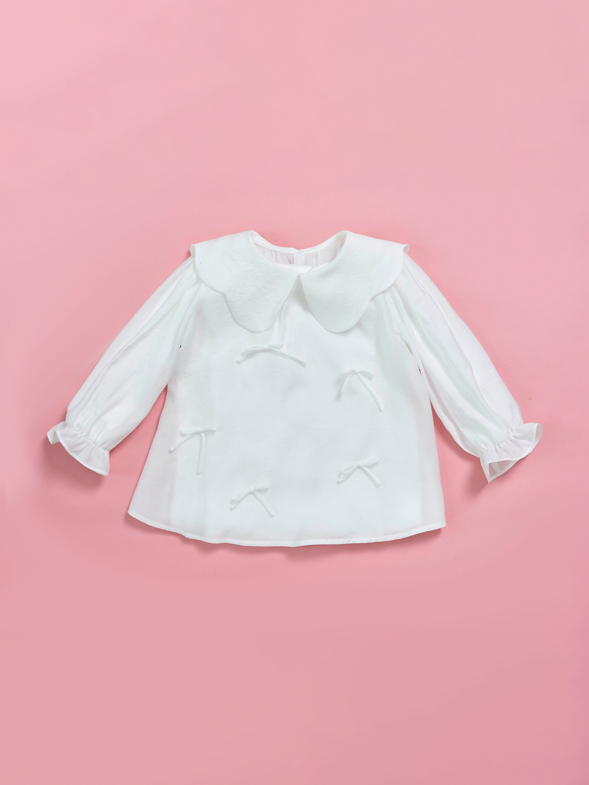 Áo tay bèo cổ lượn đính nơ