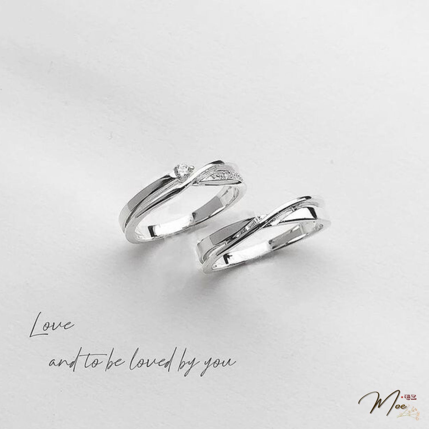 ĐN74 - Nhẫn đôi xoắn chéo đá chủ cách điệu