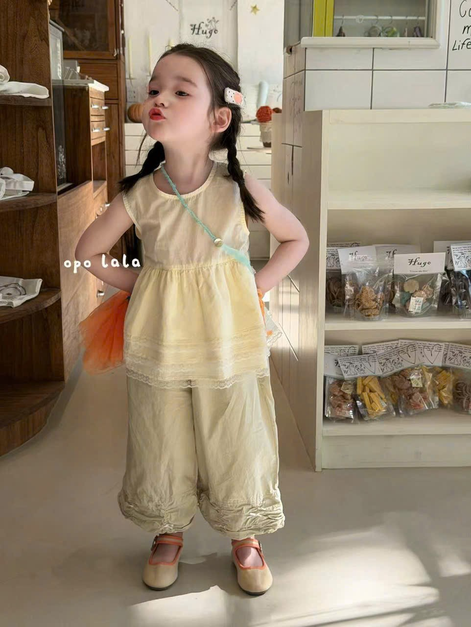 C95 - Áo thô sát nách bèo tầng màu vàng hãng Opl (Sz90-130)