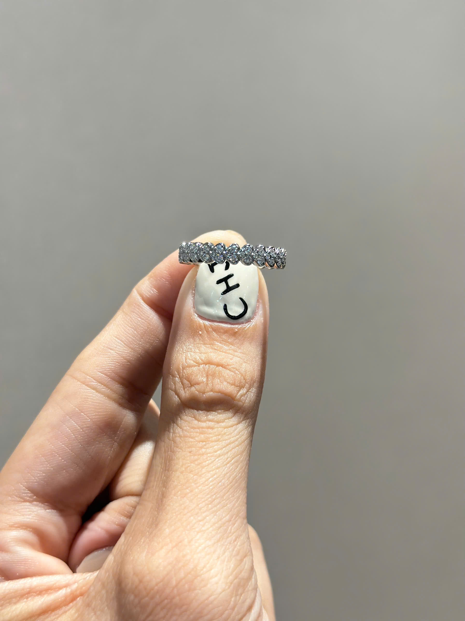 Nhẫn kết vàng trắng 18k