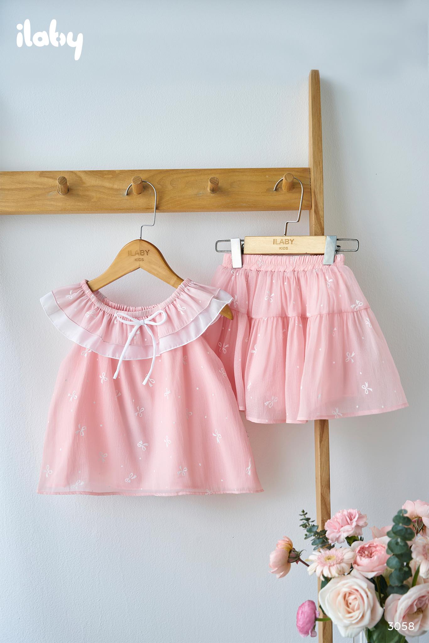 Bộ áo trễ vai ,chân váy nhún tầng