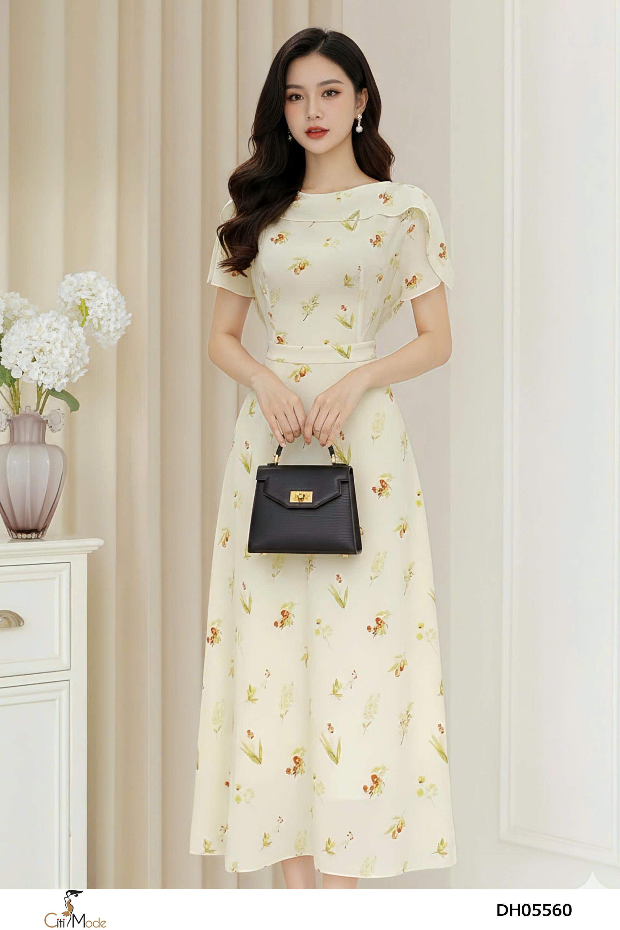 Đầm xòe hoa kem cổ vạt tay cách điệu