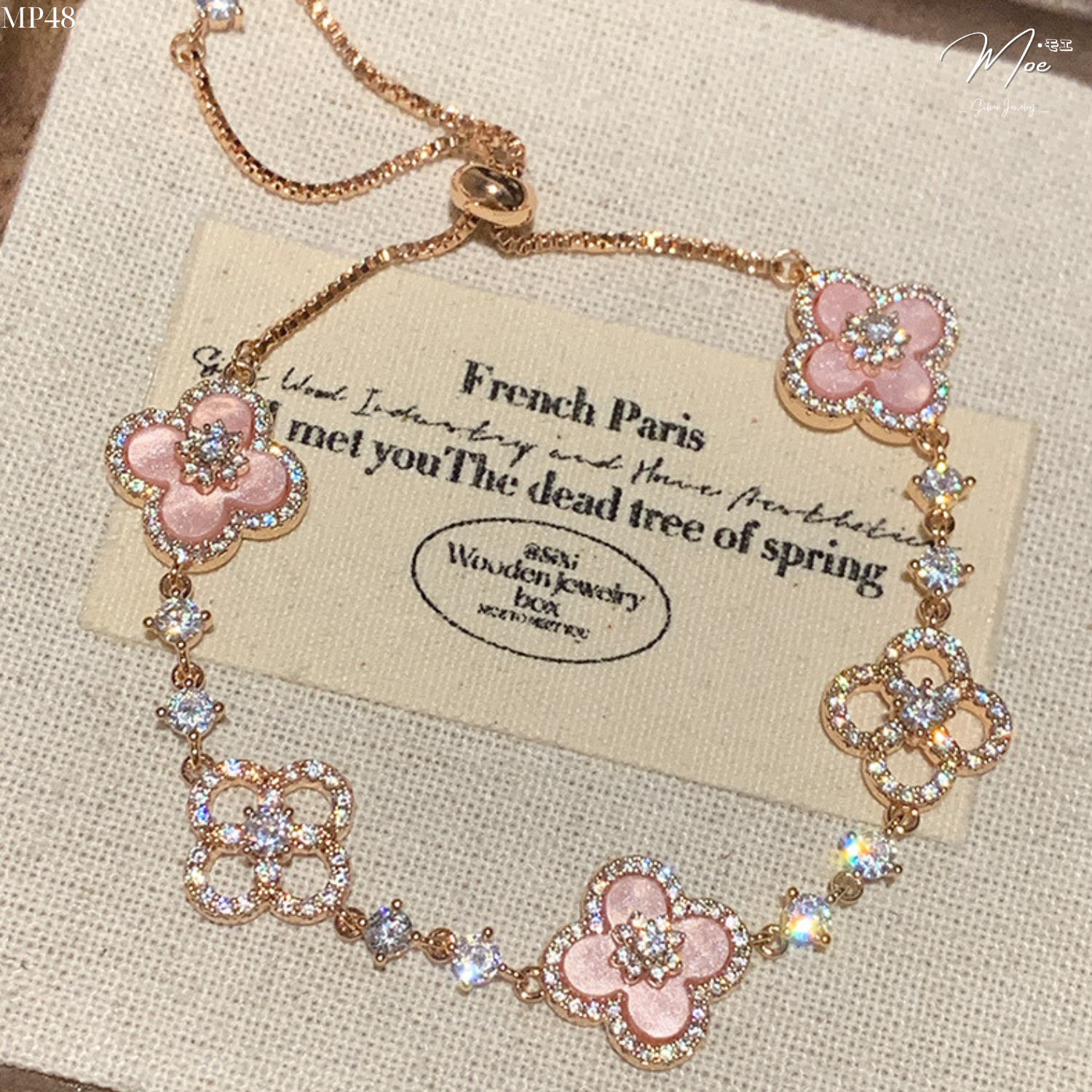 LT630 - Lắc tay Cỏ 4 lá pha lê dây rút (hồng/trắng)_thumbnail_5