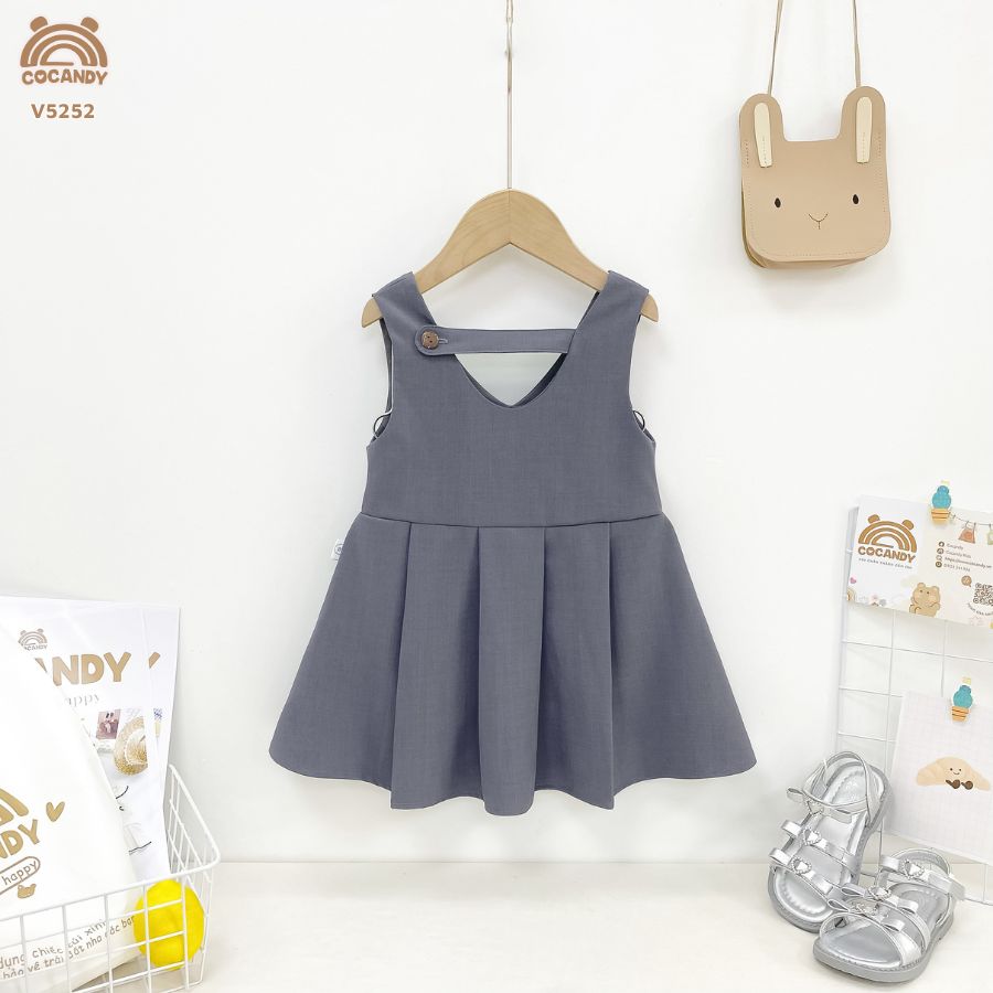 Váy yếm cộc GHI  nơ xếp ly