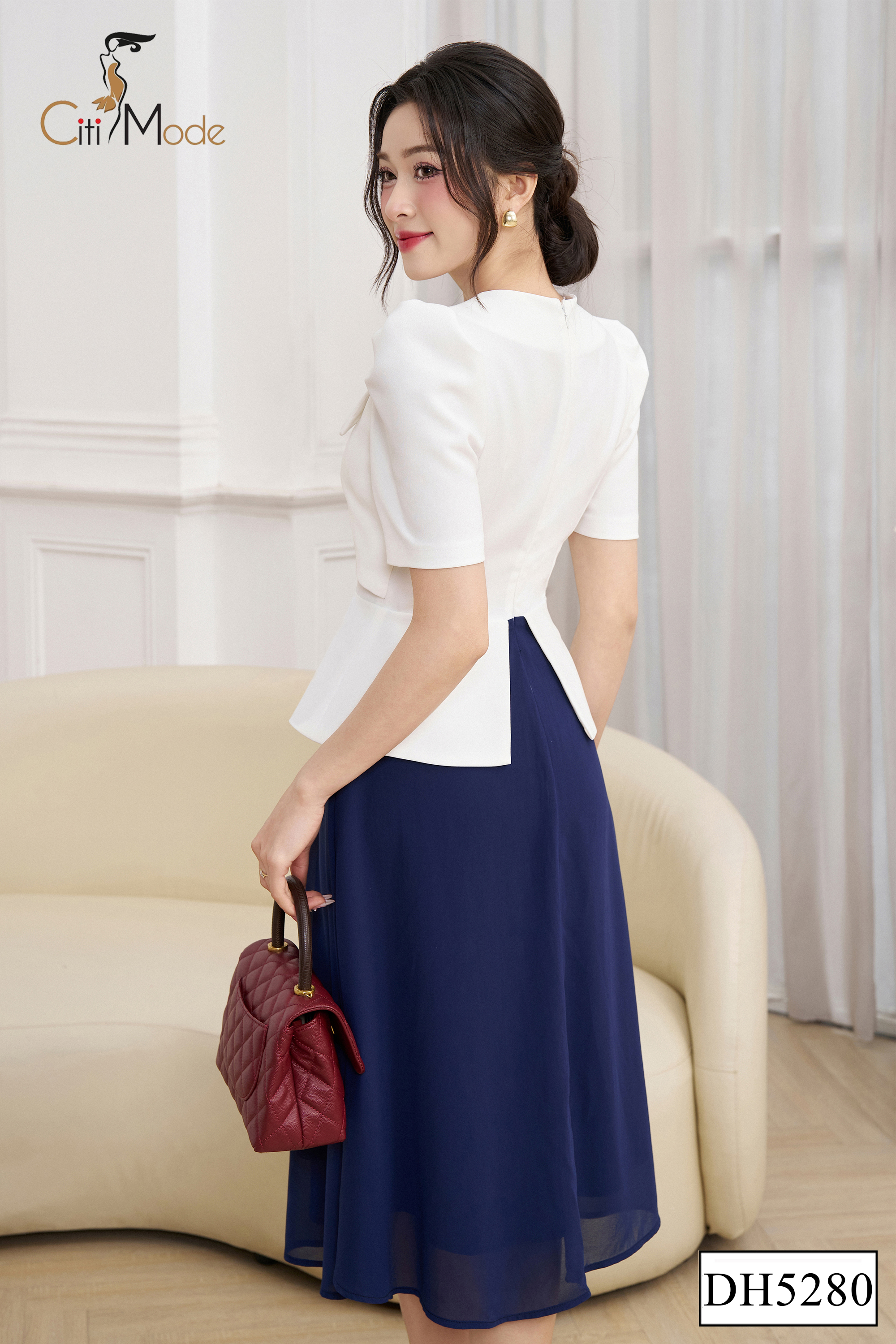 Đầm xoè trắng phối chân váy voan xanh