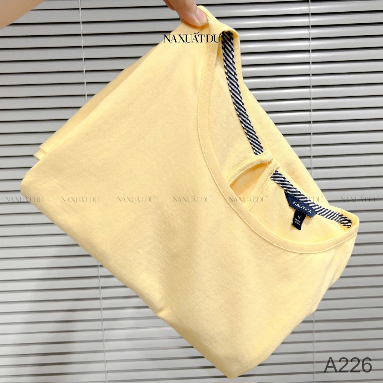 Áo thun cột dây màu vàng nữ 