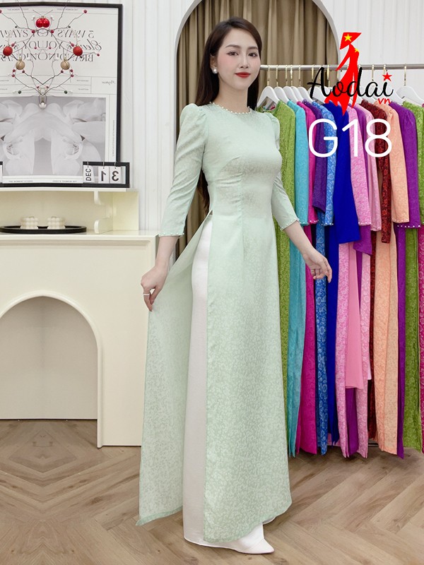 Áo dài Gấm G18 màu xanh bạc hà cổ tròn tay bồng nhẹ đính hạt ngọc
