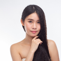 woman-wearing-white-strapless-dress-hands-touching-chin