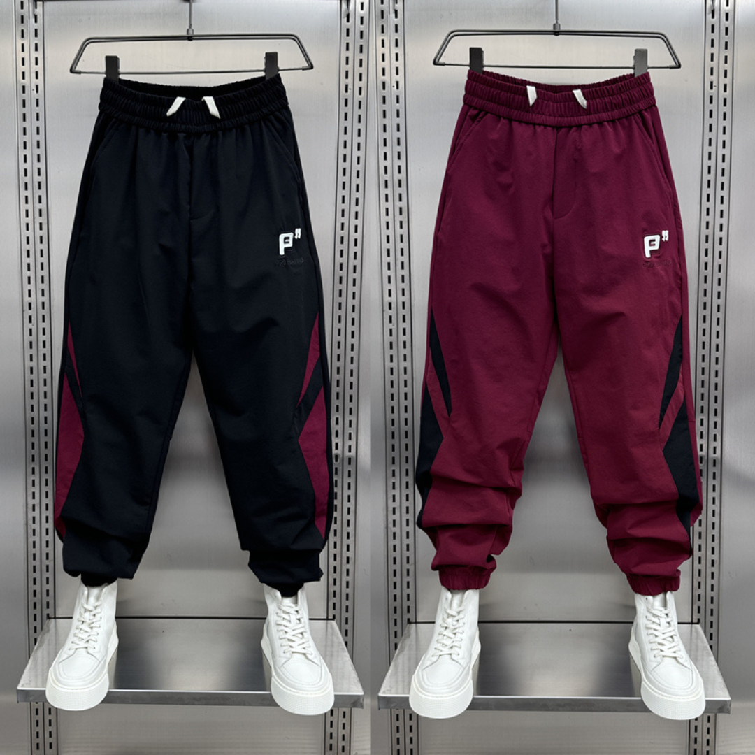 Quần Gió Jogger Unisex Cao Cấp – Vải Gió Hạt Mịn Nhẹ, Bo Gấu Co Giãn, Phong Cách Năng Động - QH05_thumbnail_2
