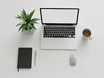 pngtree-clean-white-desk-minimalist-laptop-mockup-flat-lay-image_19858301