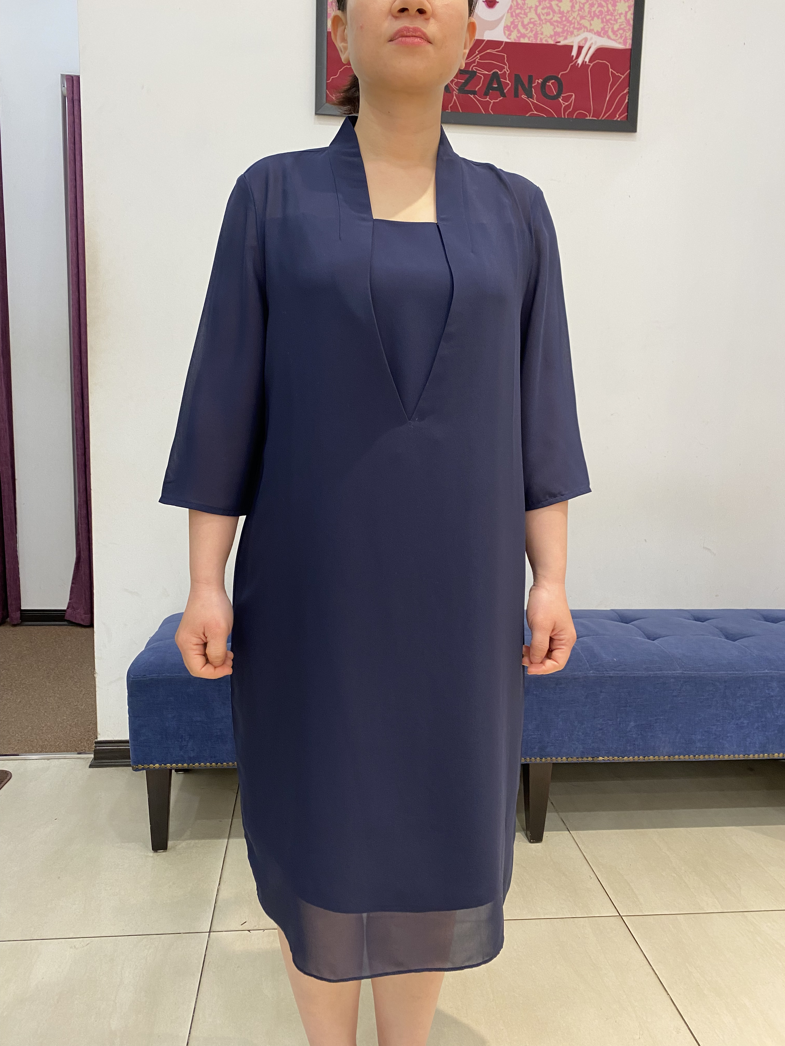 Váy xanh suông bom tim cổ leo