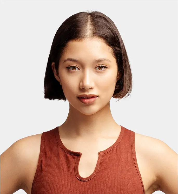 lovely-satisfied-freckled-female-with-crisp-hair-has-gentle-smile-dressed-striped-black-white-shirt-rejoices-positive-moments-life-isolated-wall-people-emotions-3