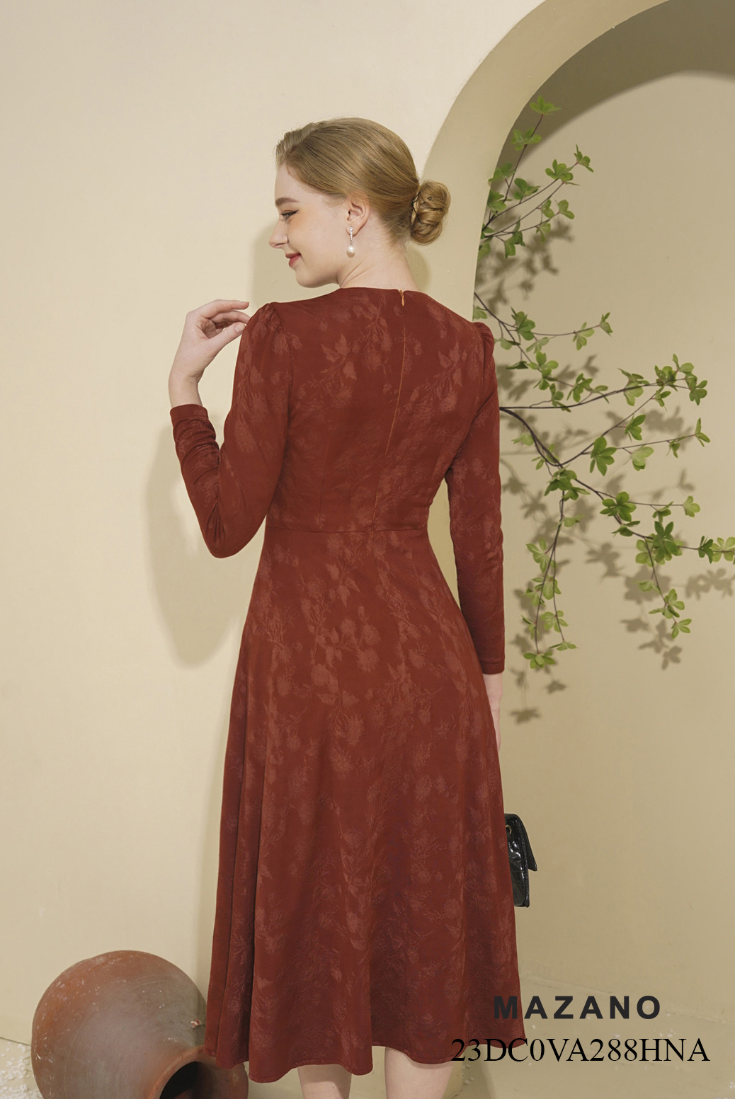 Đầm len xoắn ngực chân A rủ