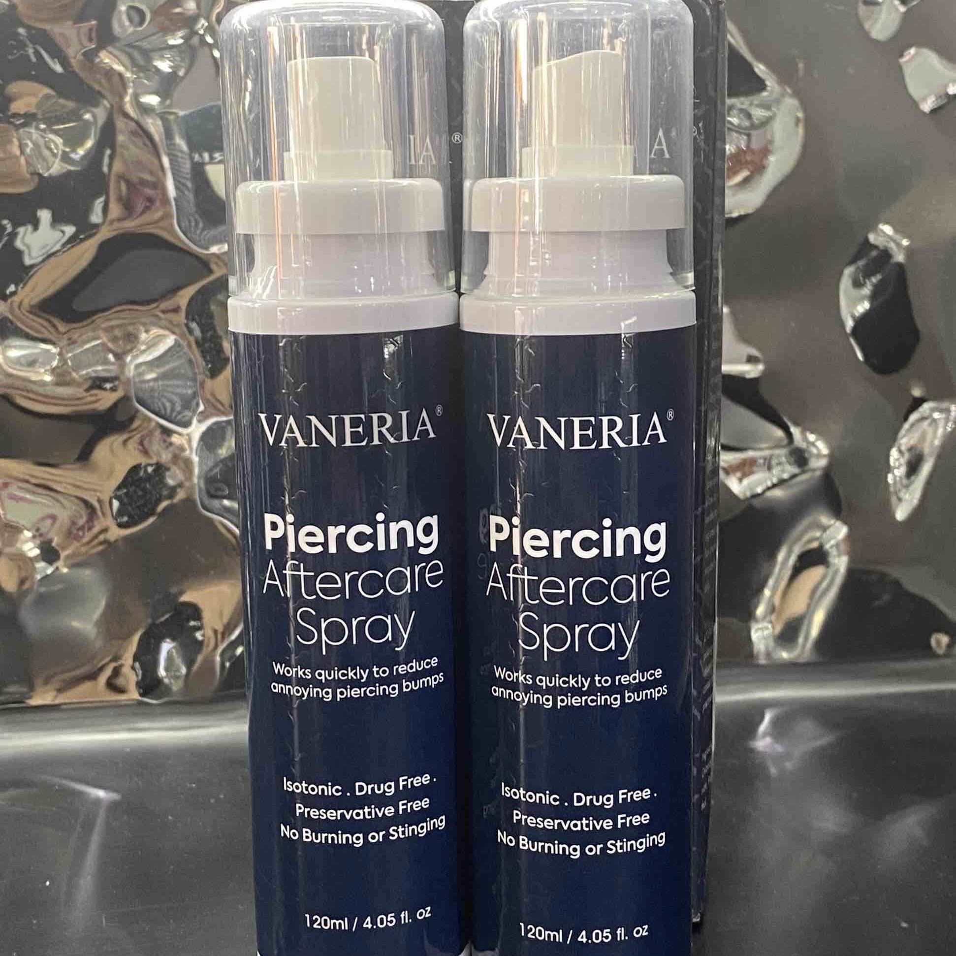 Dung dịch vệ sinh sau xỏ chai xanh lớn tặng kèm tăm bông