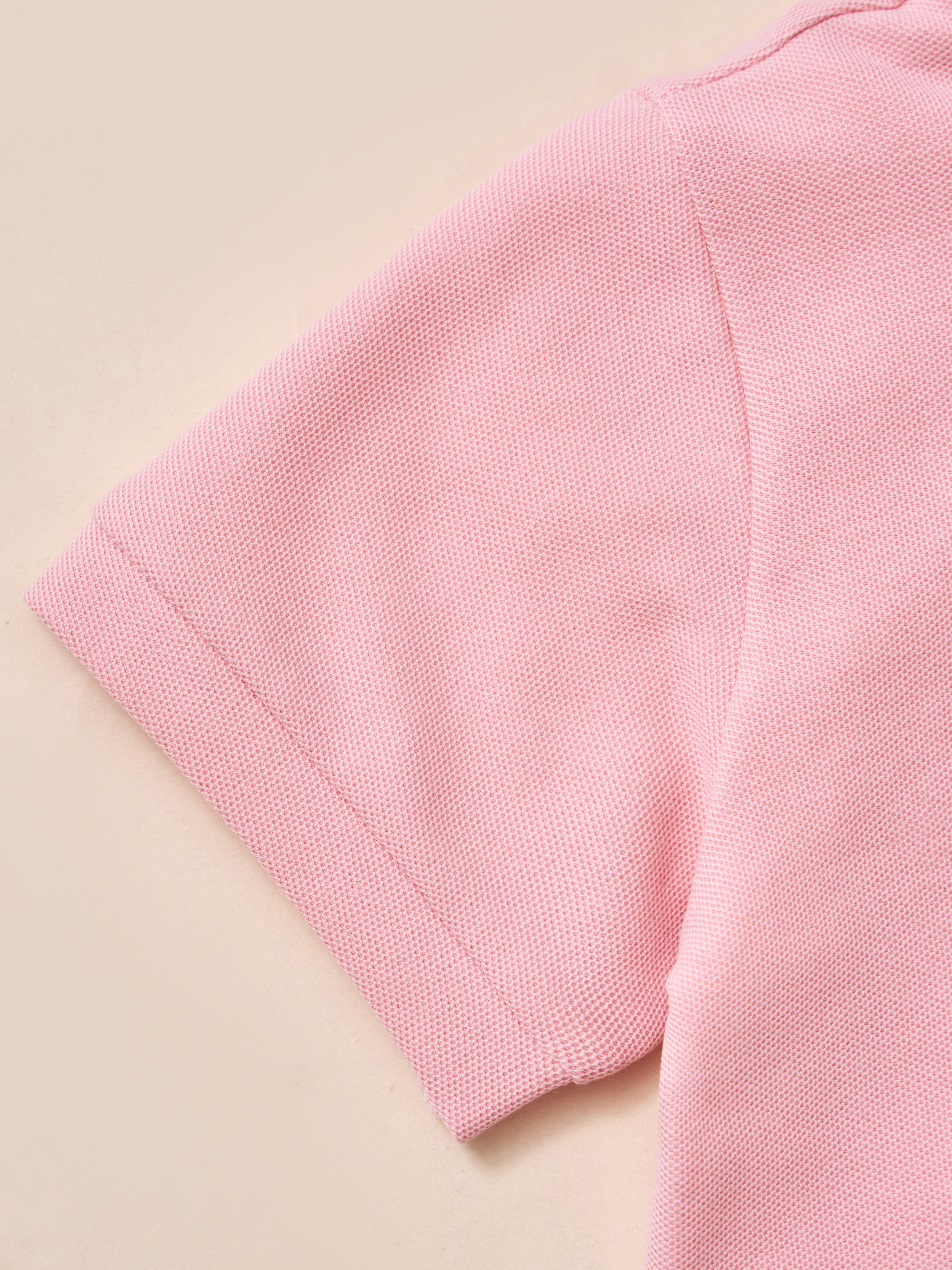 Polo lá cổ đức thêu ngực