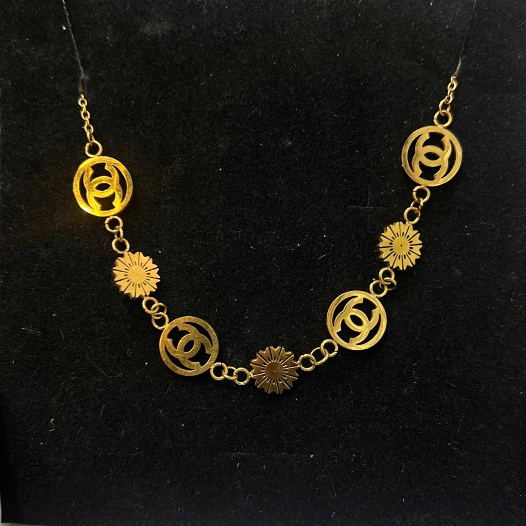vòng tay titan vàng charm Celin tròn dẹt mix mặt trời