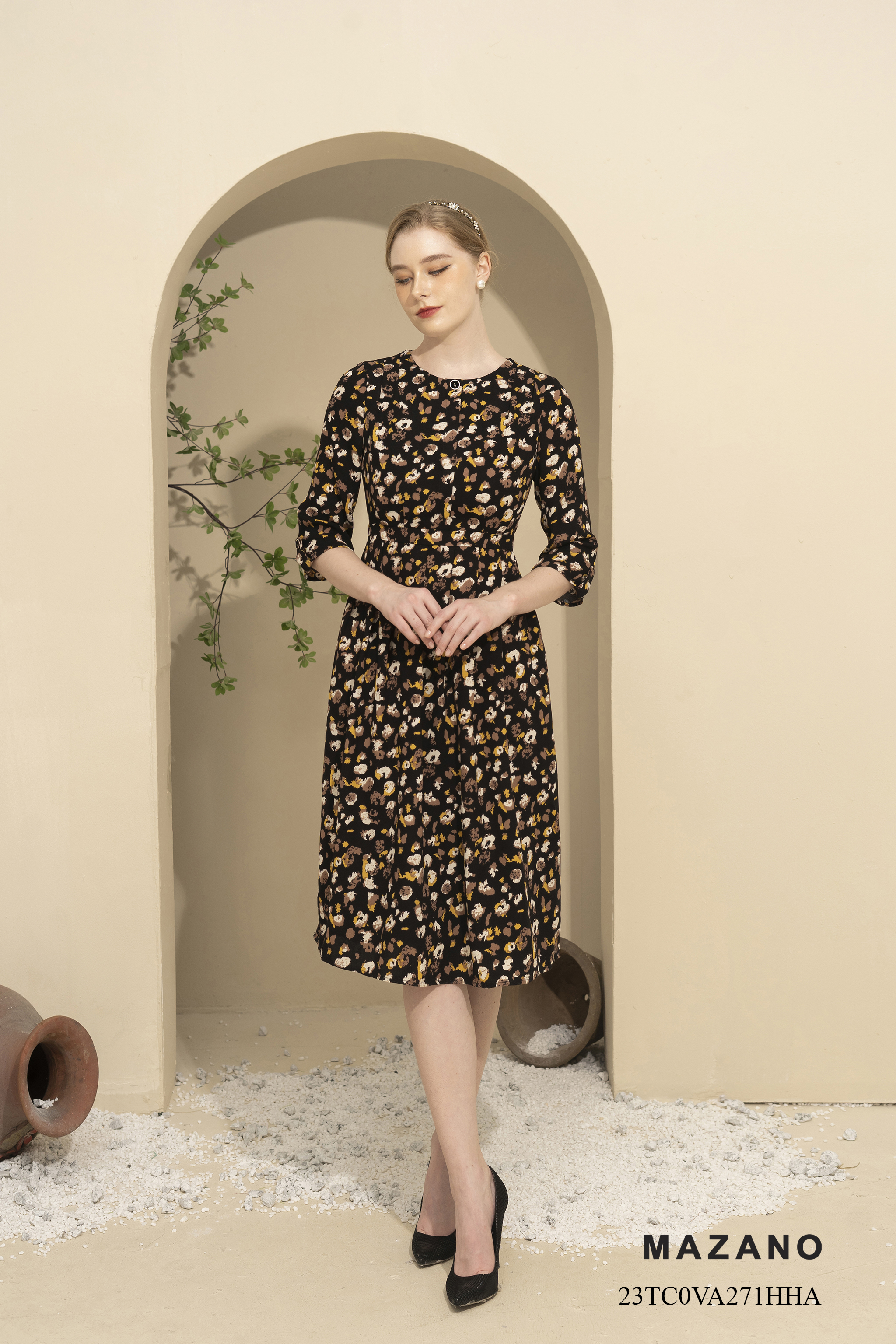 Đầm can eo chân xếp hoa nhí