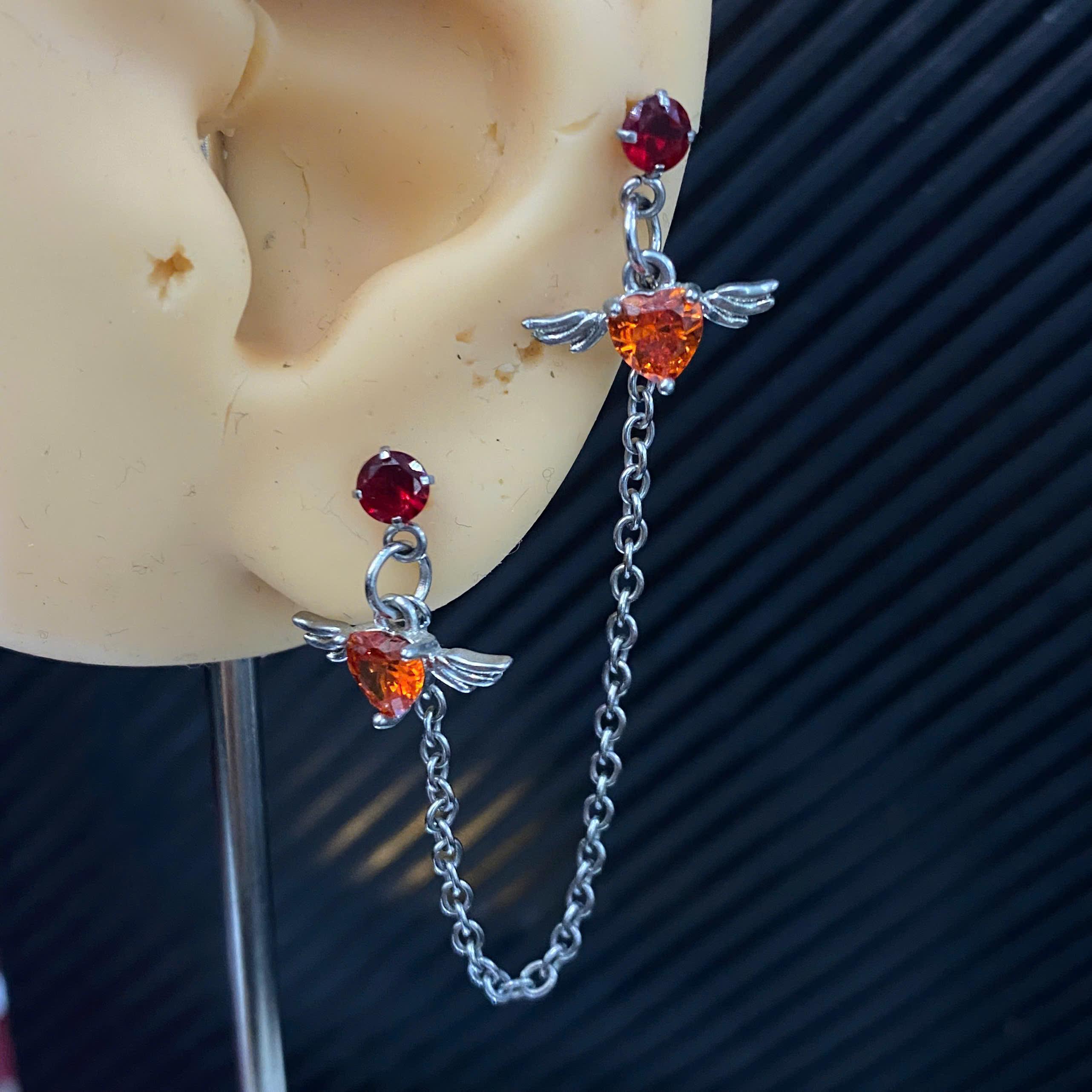 Khuyên kiểu xích đôi cánh thiên thần đỏ loè đỏ loẹt xích đơn._thumbnail_3