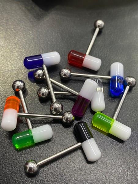 Lưỡi viên thuốc 2 màu.