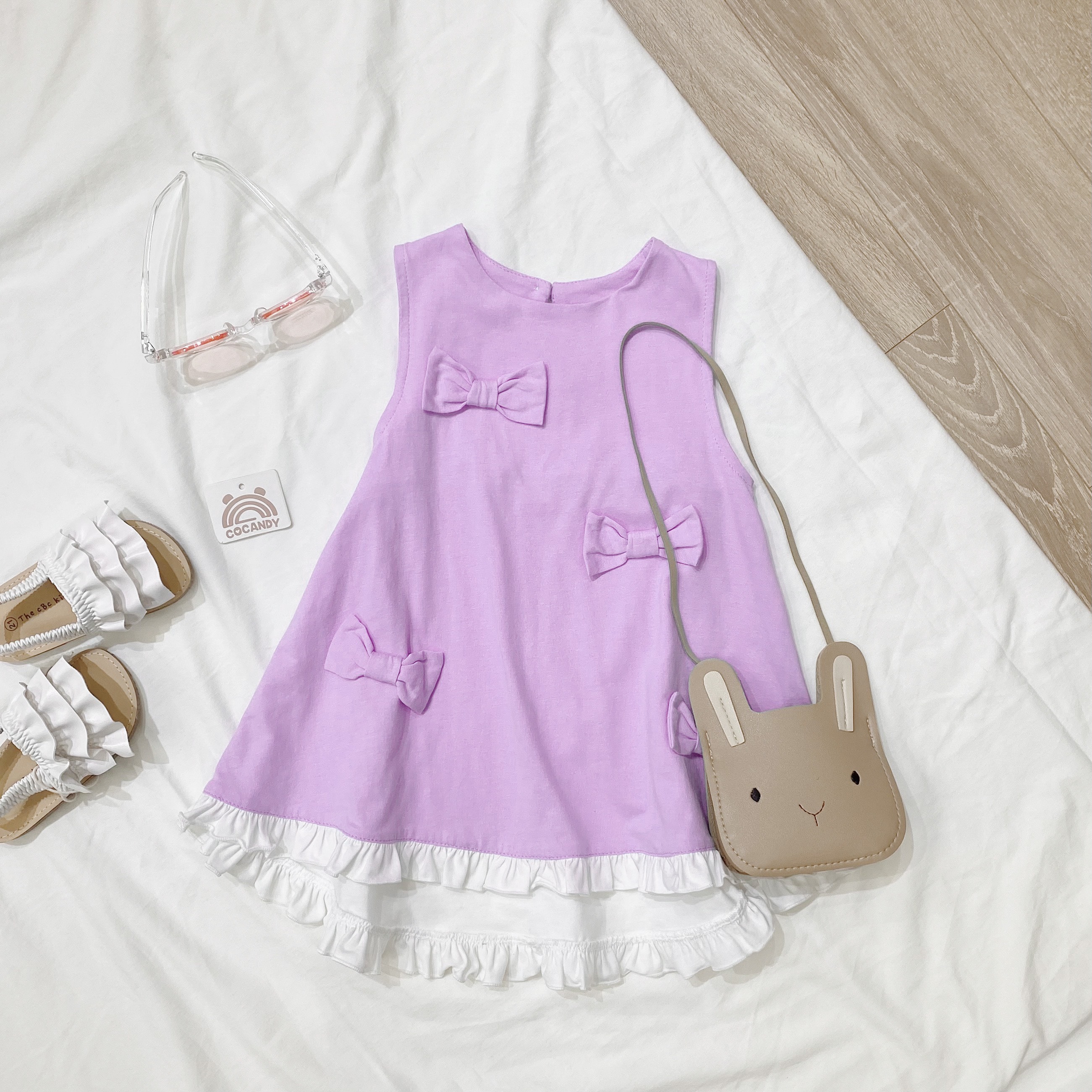 Váy TÍM viền TRẮNG nhiều nơ