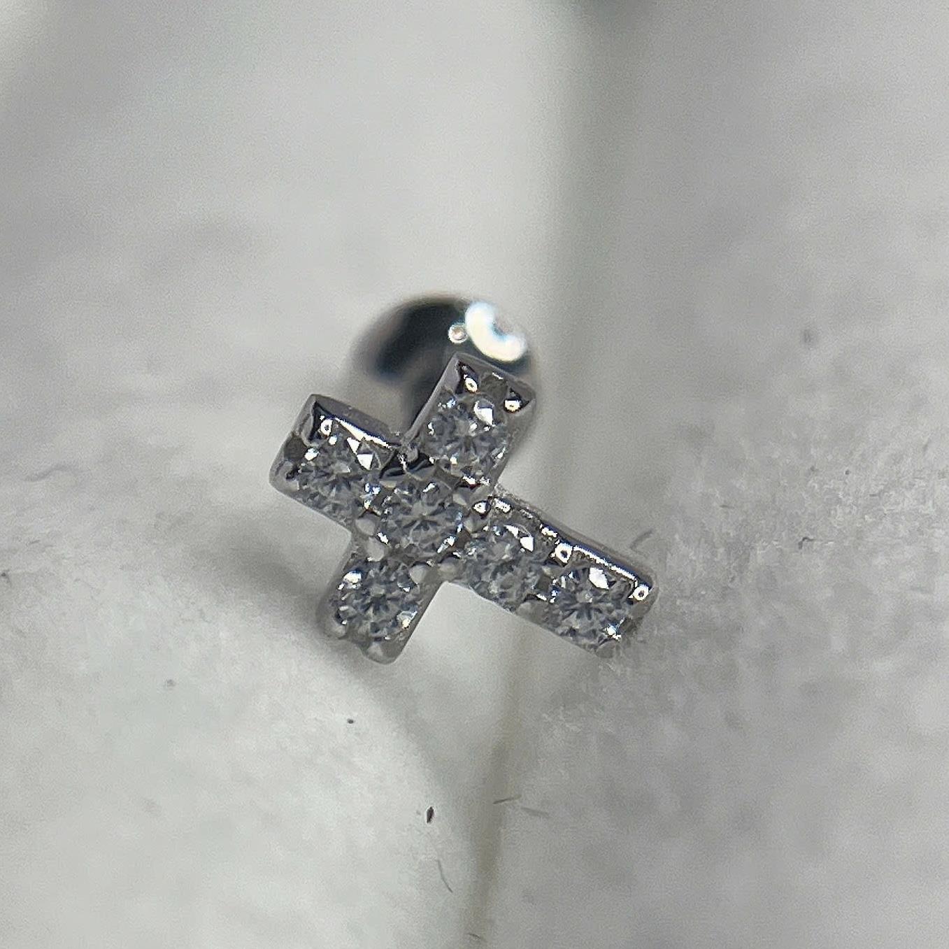 Khuyên kiểu bạc hình cây thánh giá đính kim cương.