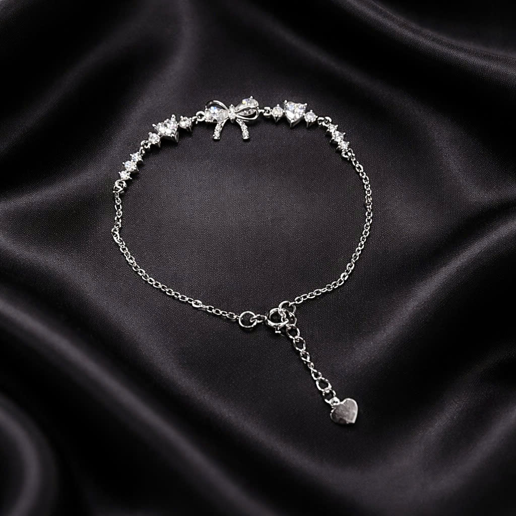 Vòng tay bạc xi bạch kim nơ trắng