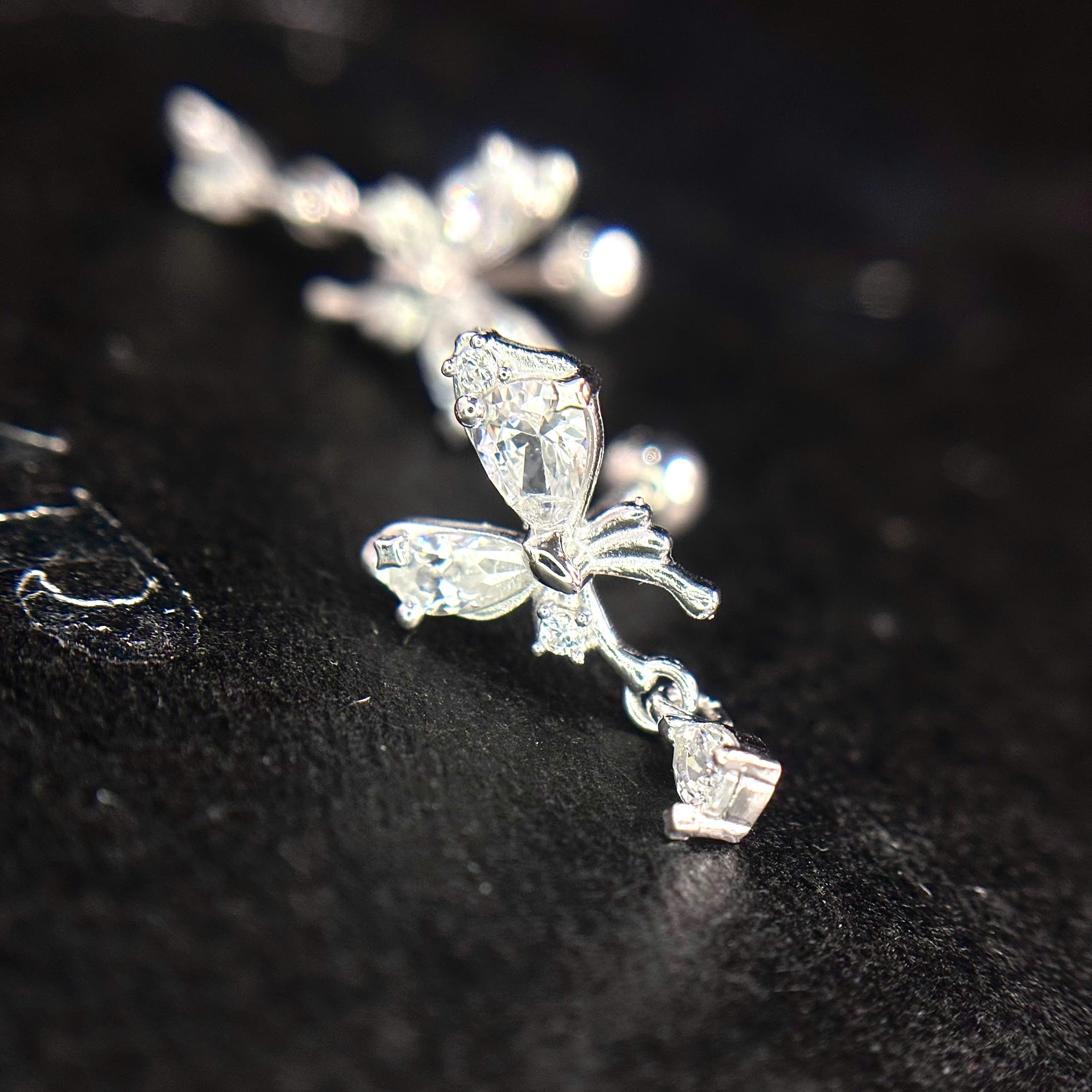 Khuyên kiểu bạc si kim bướm trắng kiểu rơi đá_thumbnail_1