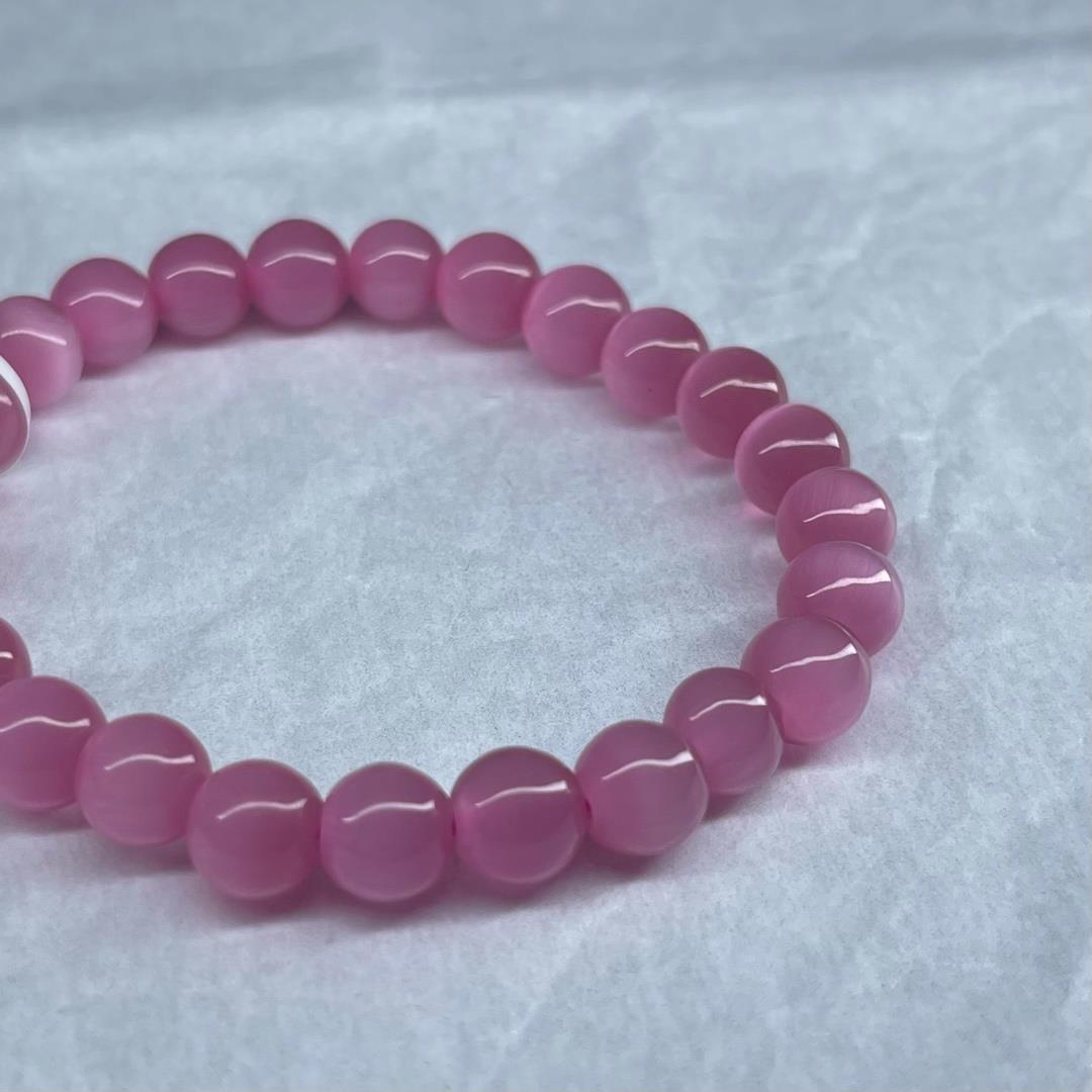 Vòng tay phong thuỷ đá mắt mèo hồng._thumbnail_2