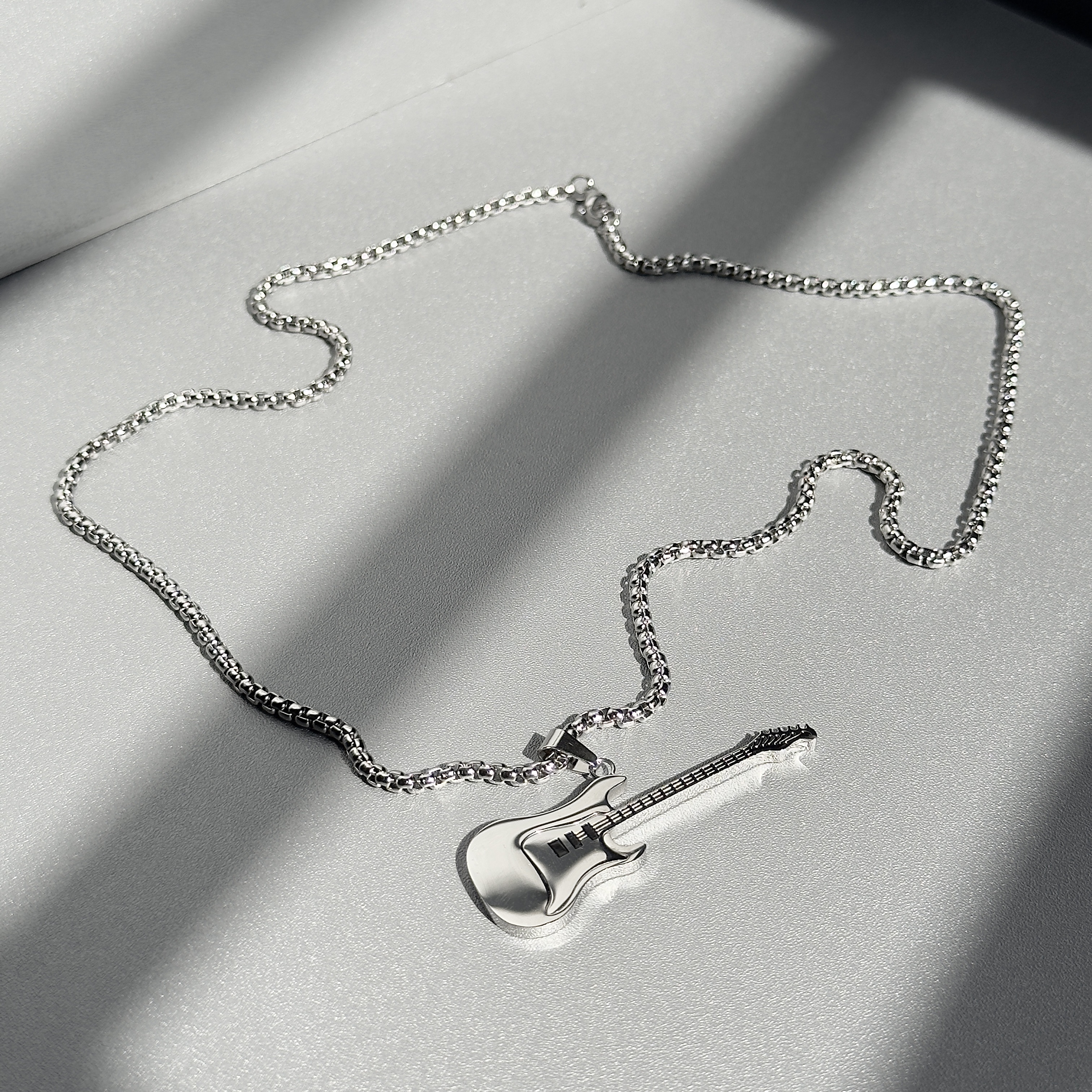Dây chuyền Guitar
