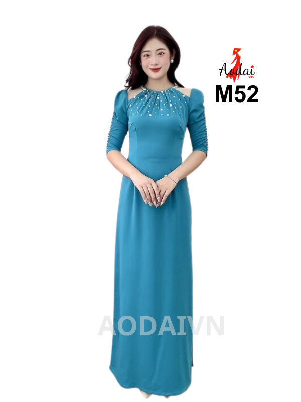 M52 Áo dài thiết kế lụa mỹ màu xanh ngọc cổ tròn, vai ghép Lưới tay bồng đính pha lê