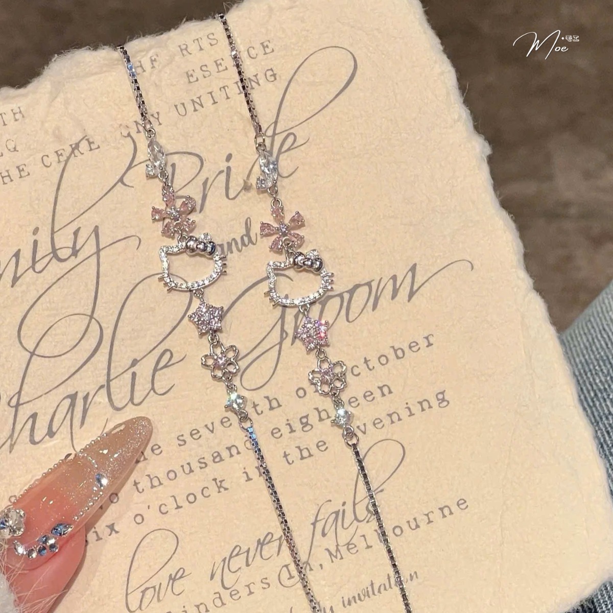 LT631 - Lắc tay Hello Kitty hoa đá pha lê (trắng/hồng)_thumbnail_4