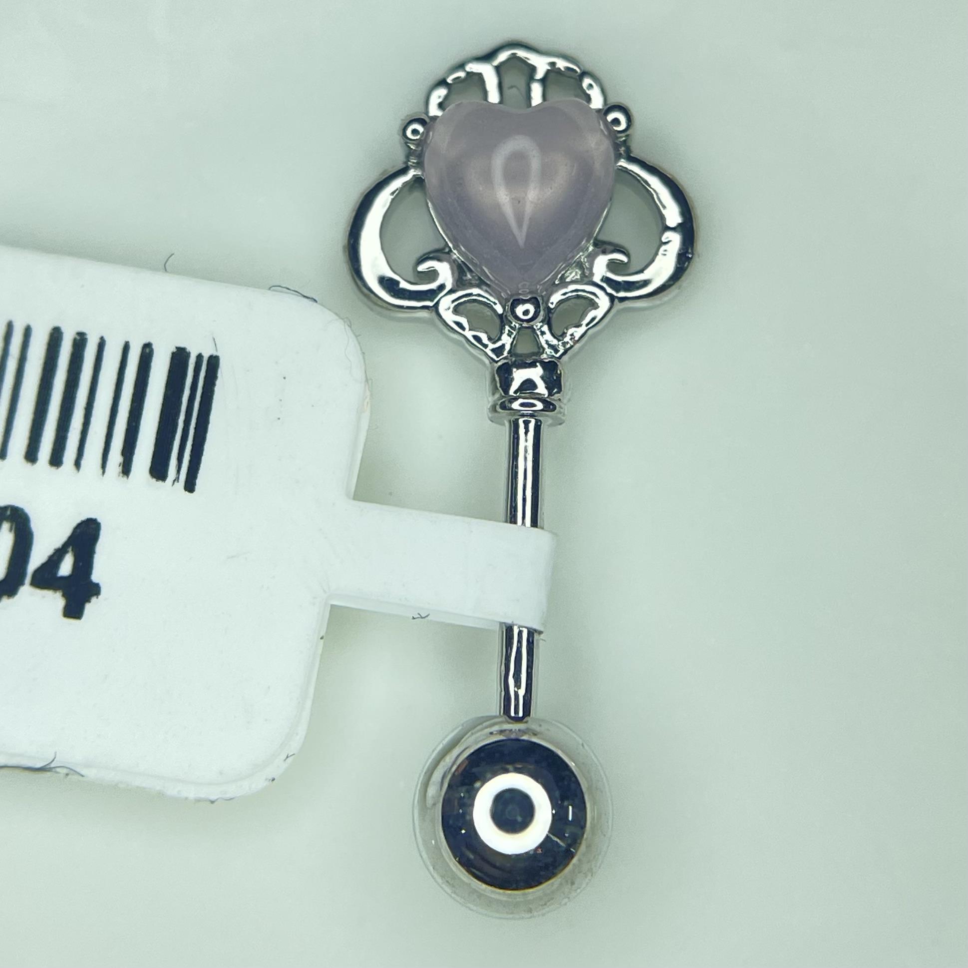 Khuyên kiểu vertical lồng bí ngô đính kim cương trái tim hồng