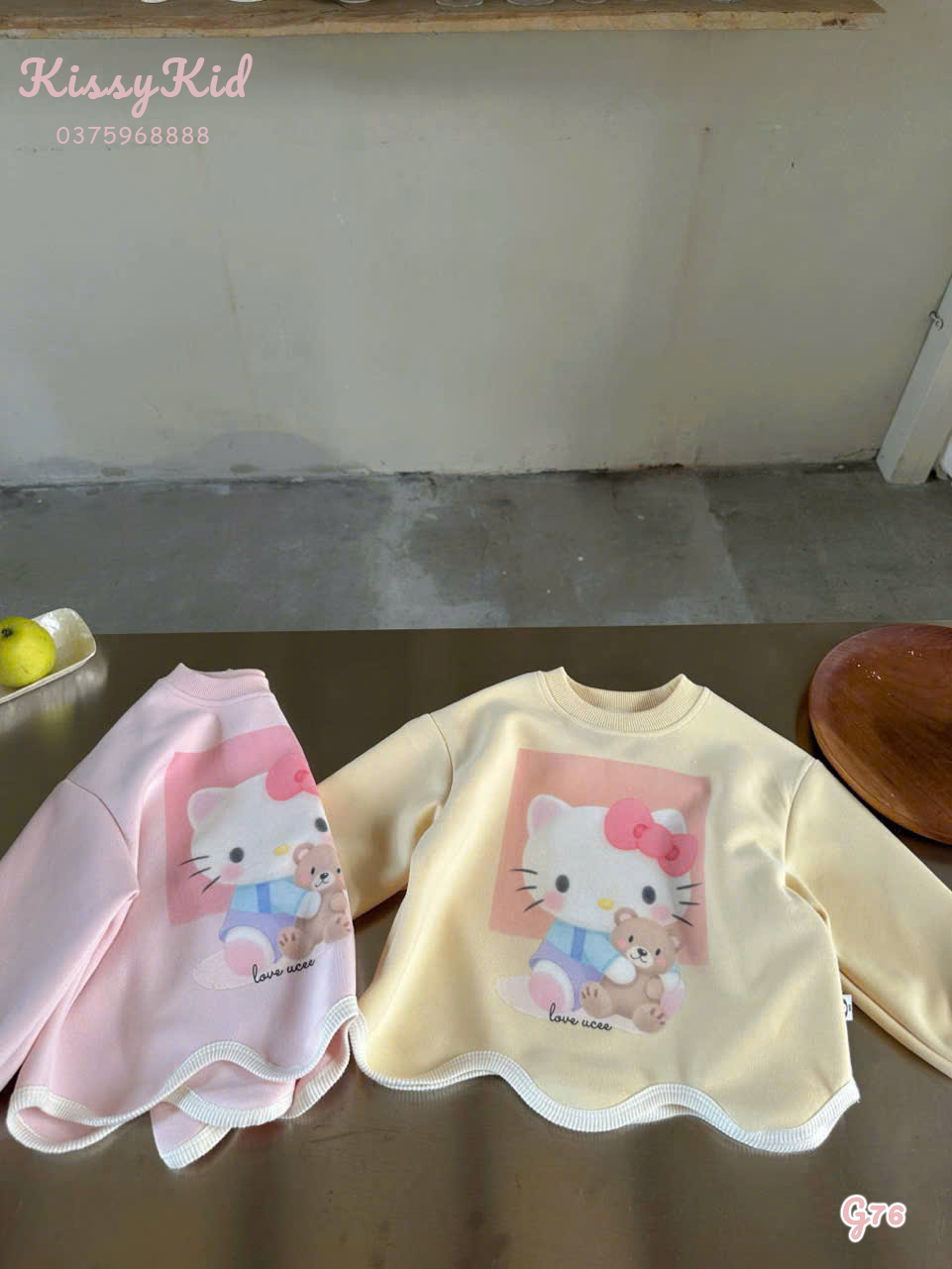 (G76) Áo nỉ vàng mỡ hoạ tiết Kitty hãng Ucee Heyduck_thumbnail_0