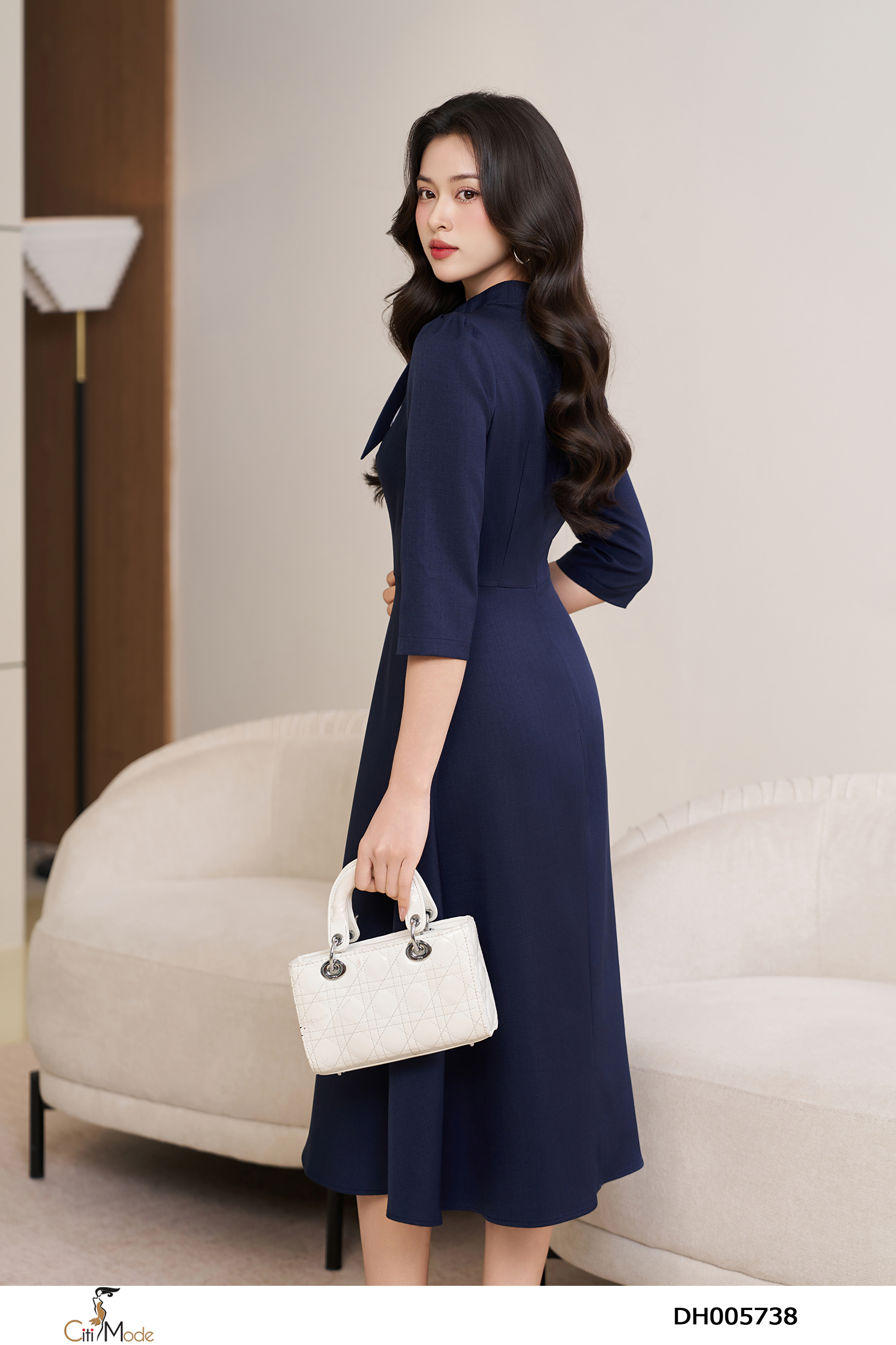 Đầm xòe tím than cổ tròn phối kẻ vạt nơ tay lỡ