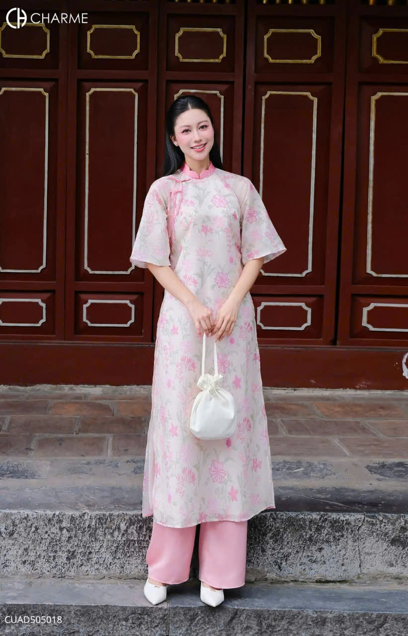 Áo dài tơ thêu hoa nơ chéo