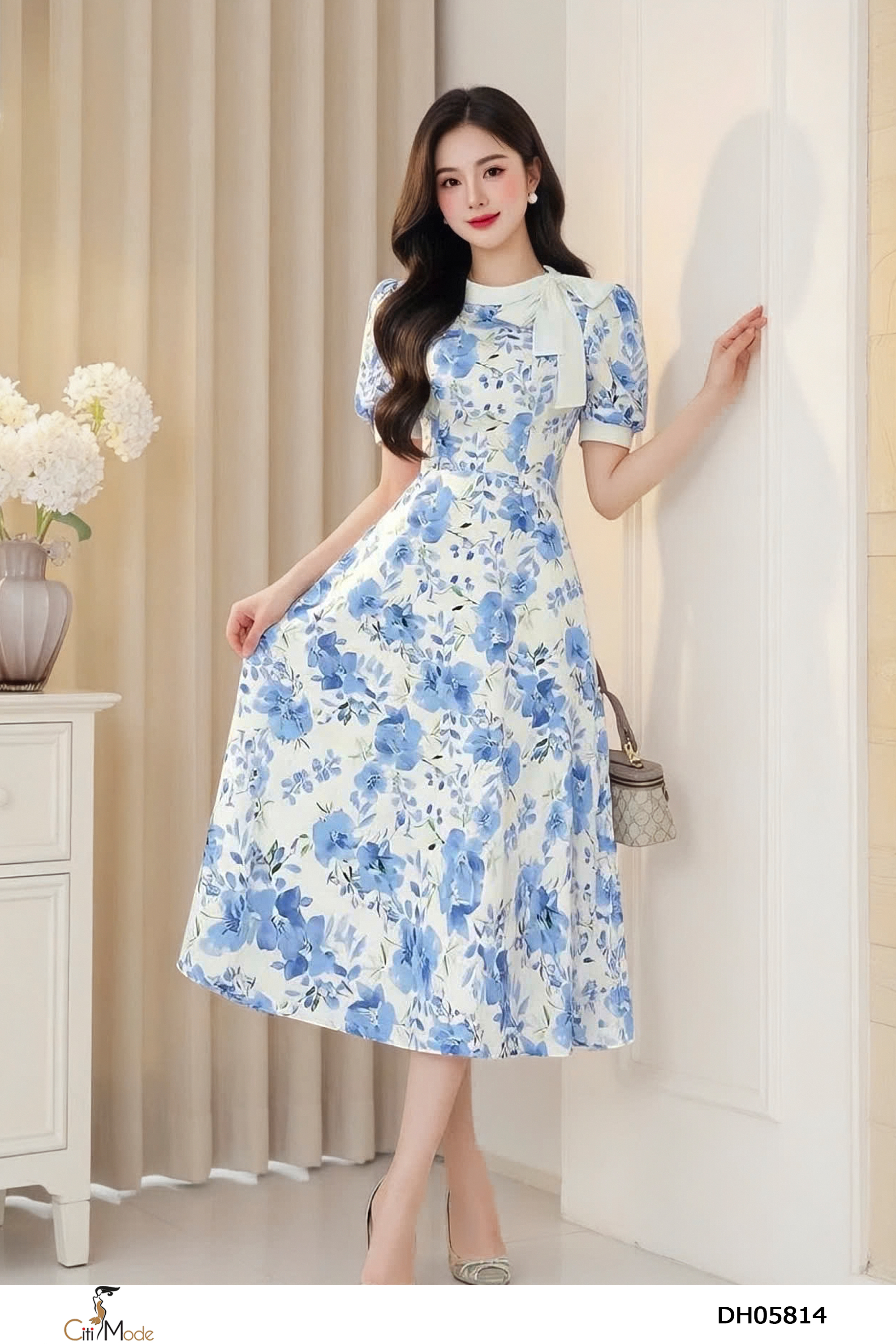 Đầm xòe hoa xanh cổ phối nơ tay cọc