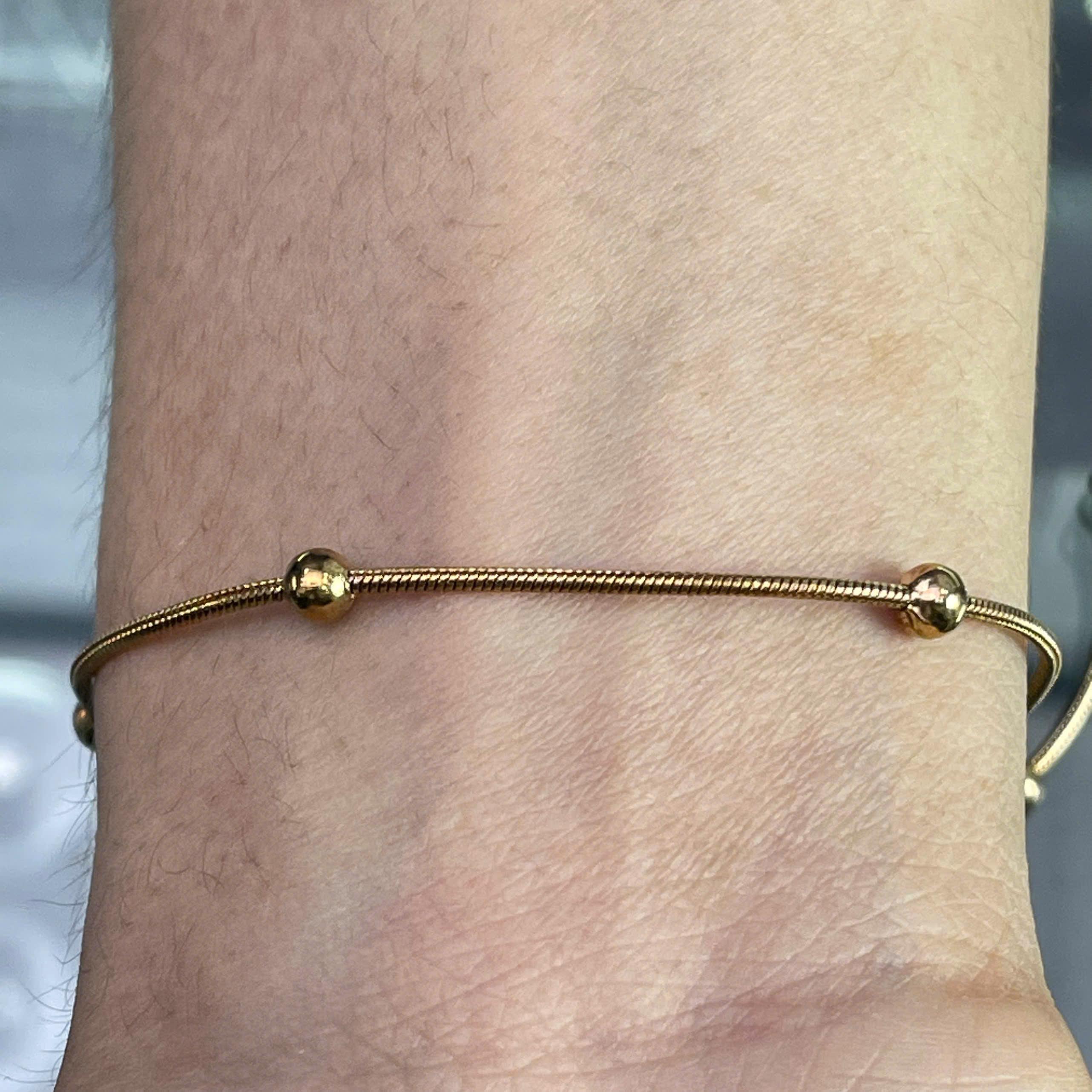 lắc chân sợi vàng 5 charm bi titan._thumbnail_3